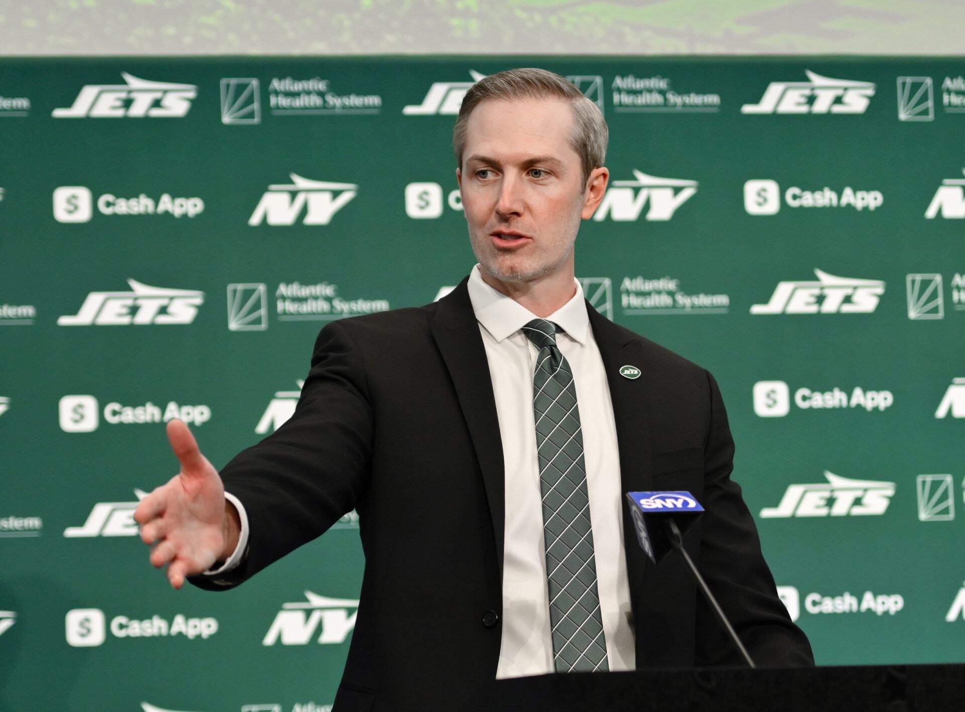 New York Jets general manager Darren Mougey speaks during an introductory press conference at Atlantic Health Jets Training Center.