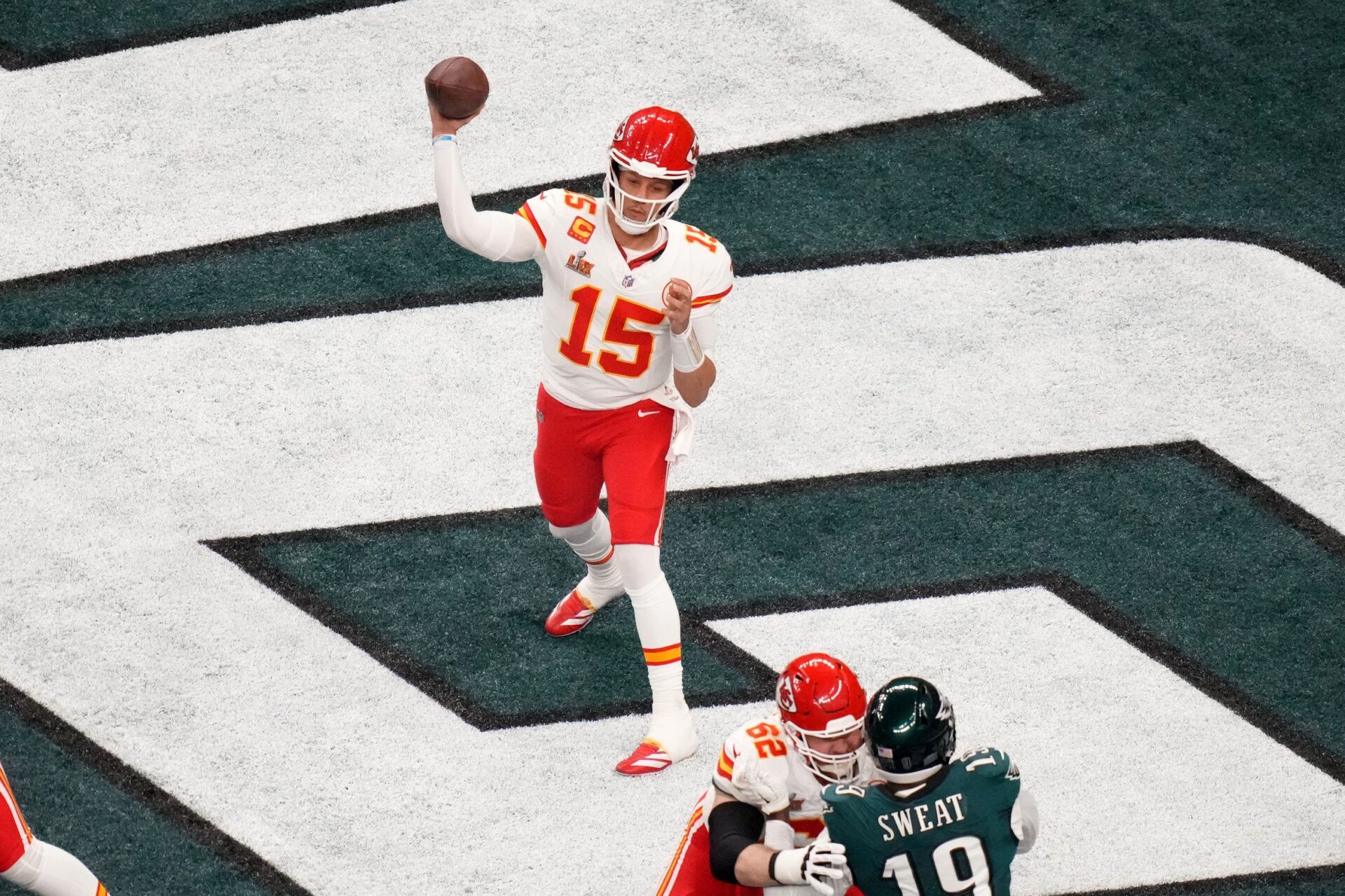 Kansas City Chiefs quarterback Patrick Mahomes (15) drops back to pass against the Philadelphia Eagles during the second quarter in Super Bowl LIX at Caesars Superdome.