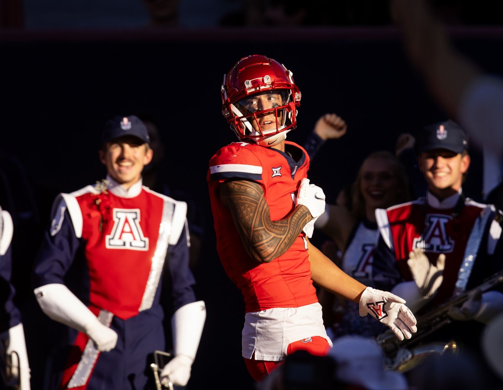 Arizona Wildcats wide receiver Tetairoa McMillan (4) celebrates a touchdown against the Arizona State Sun Devils in the second half during the Territorial Cup at Arizona Stadium.