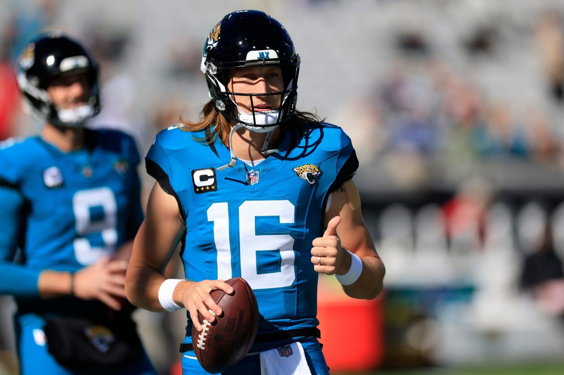 Jacksonville Jaguars quarterback Trevor Lawrence (16) gives a thumbs up before an NFL football matchup Sunday, Dec. 1, 2024 at EverBank Stadium in Jacksonville, Fla.