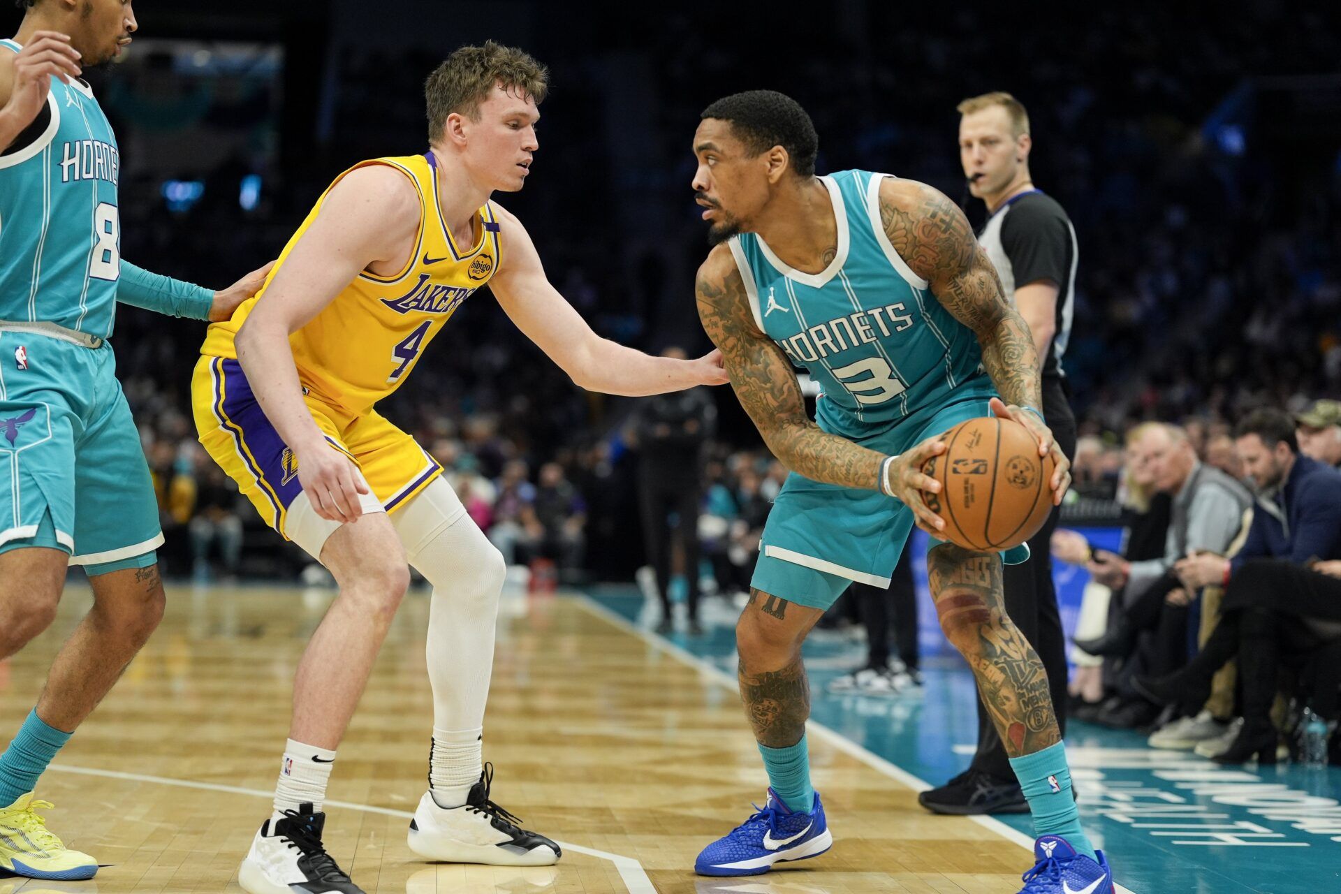 Charlotte Hornets guard DaQuan Jeffries (3) handles the ball against Los Angeles Lakers guard Dalton Knecht (4) during the second half at the Spectrum Center.