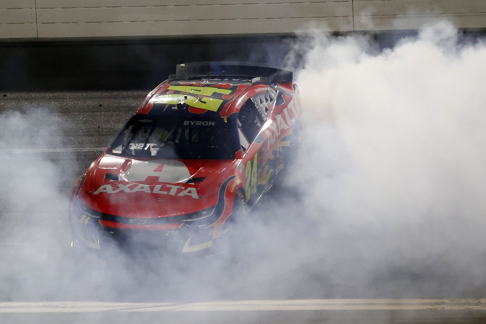 NASCAR Cup Series driver William Byron (24) does a burn out after winning the Daytona 500 at Daytona International Speedway.