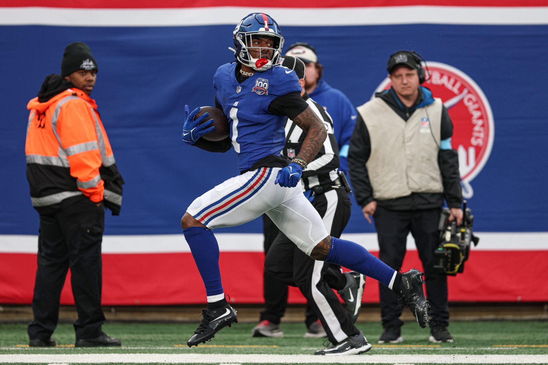 New York Giants wide receiver Malik Nabers (1) scores on a touchdown reception during the second half against the Indianapolis Colts at MetLife Stadium.