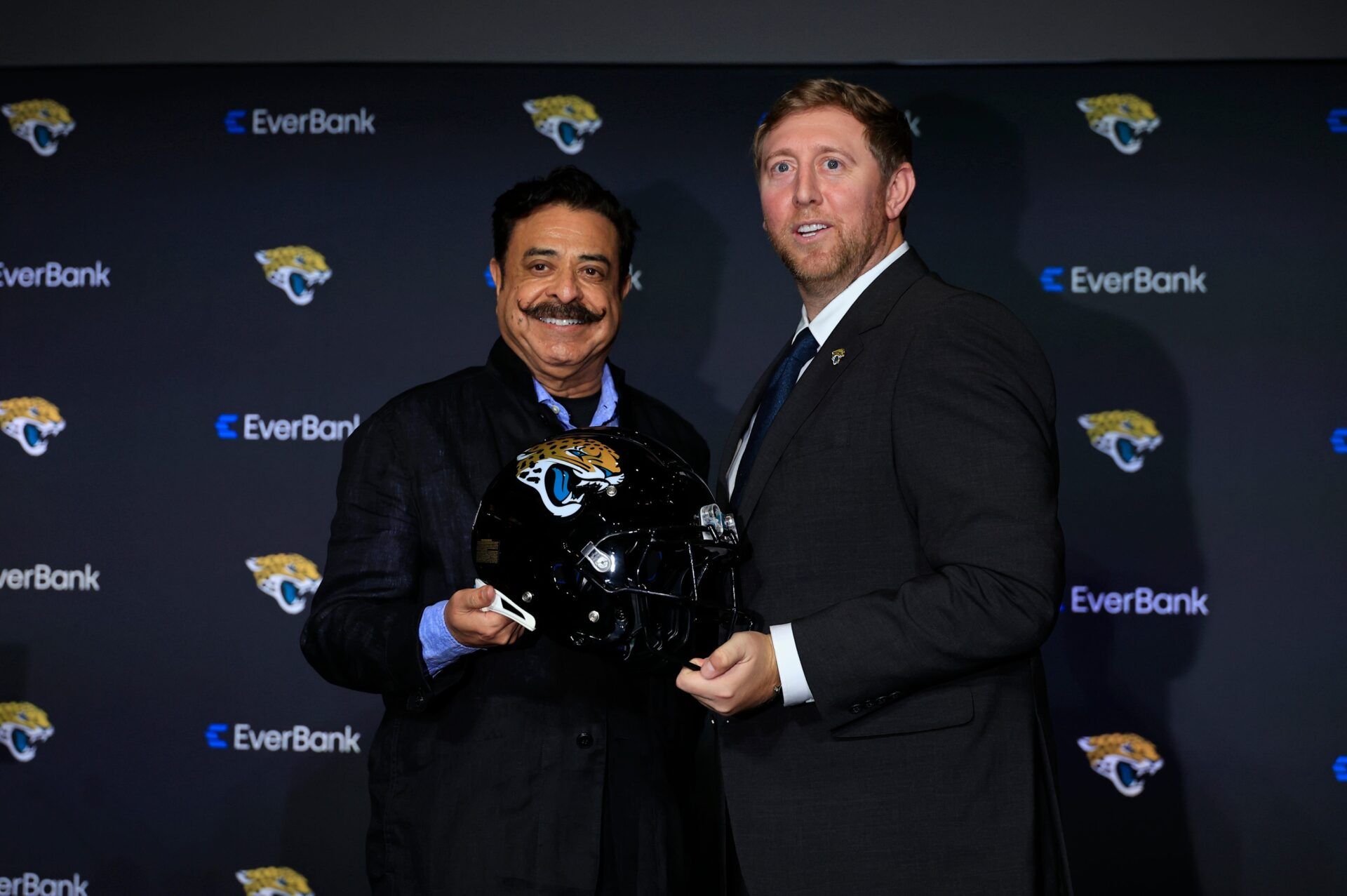 Jaguars owner Shad Khan, left, poses for a photo with new Jacksonville Jaguars head coach Liam Coen during a press conference Monday, Jan. 27, 2025 at the Miller Electric Center in Jacksonville, Fla.