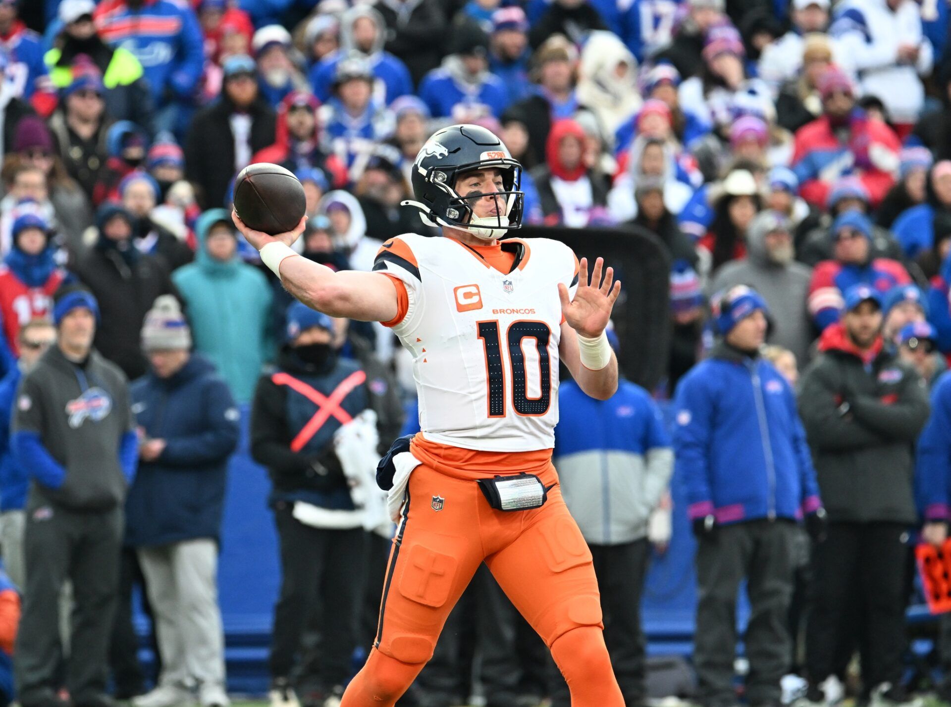 Denver Broncos quarterback Bo Nix (10) throws downfield during the fourth quarter against the Buffalo Bills in an AFC wild card game at Highmark Stadium.