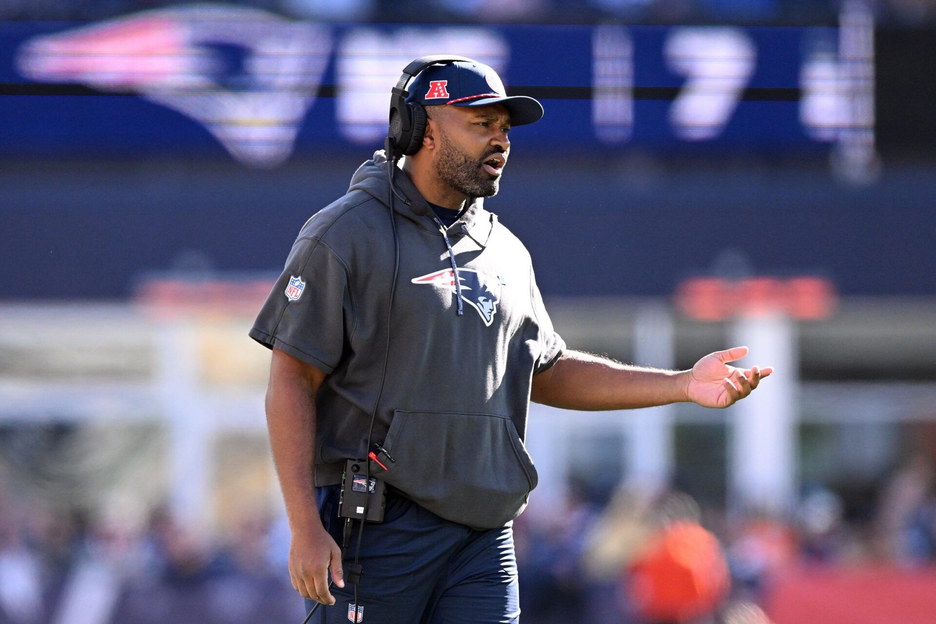 New England Patriots head coach Jerod Mayo calls a play against the New York Jets during the first half at Gillette Stadium.