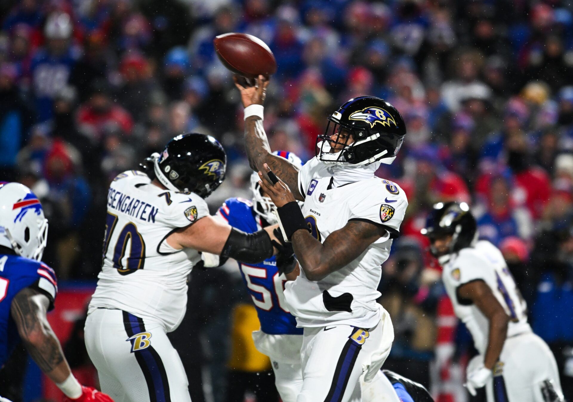 Baltimore Ravens quarterback Lamar Jackson (8) throws the ball during the fourth quarter against the Buffalo Bills in a 2025 AFC divisional round game at Highmark Stadium.