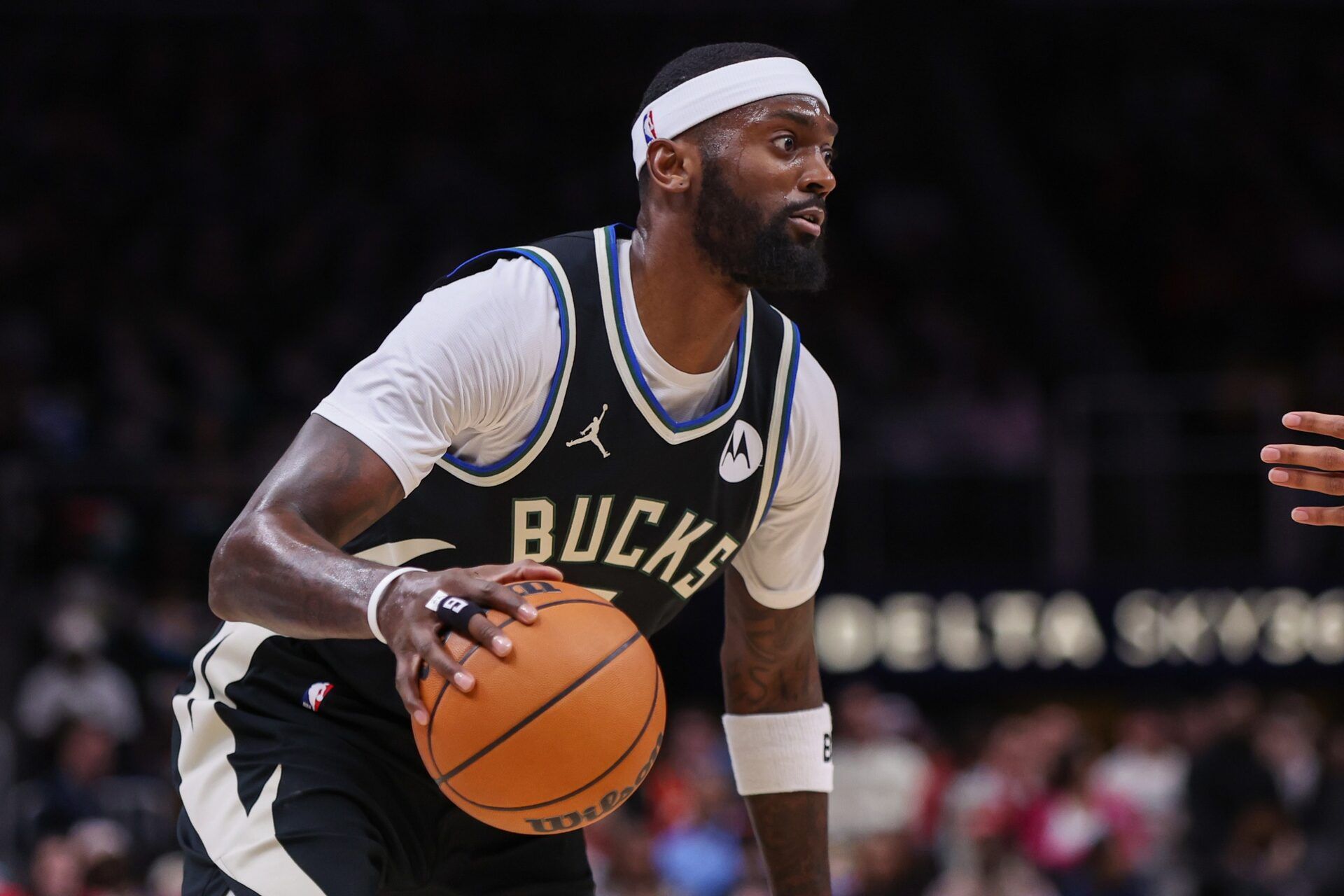 Milwaukee Bucks forward Bobby Portis (9) dribbles against the Atlanta Hawks in the first quarter at State Farm Arena.