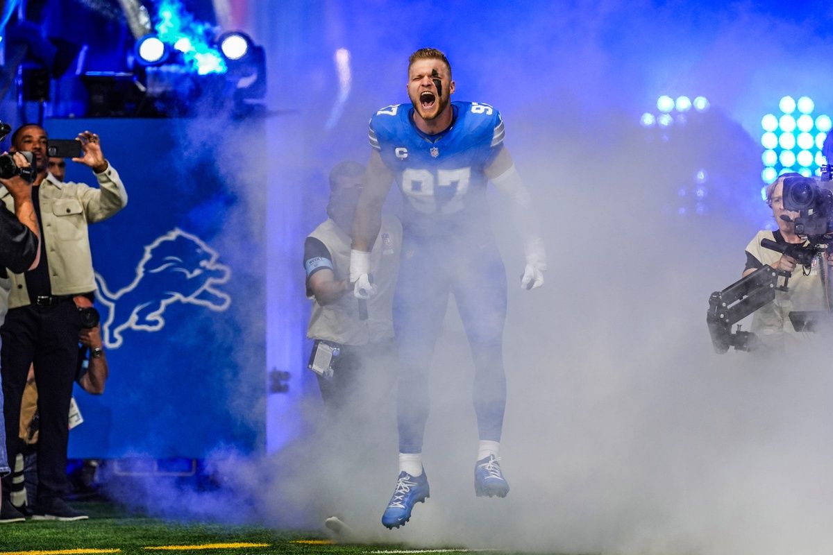 Detroit Lions Aidan Hutchinson (97) runs out of the tunnel during the Detroit Lions season opener against the Los Angeles Rams at Ford Field in Detroit, on Sunday, Sept. 8. 2024.