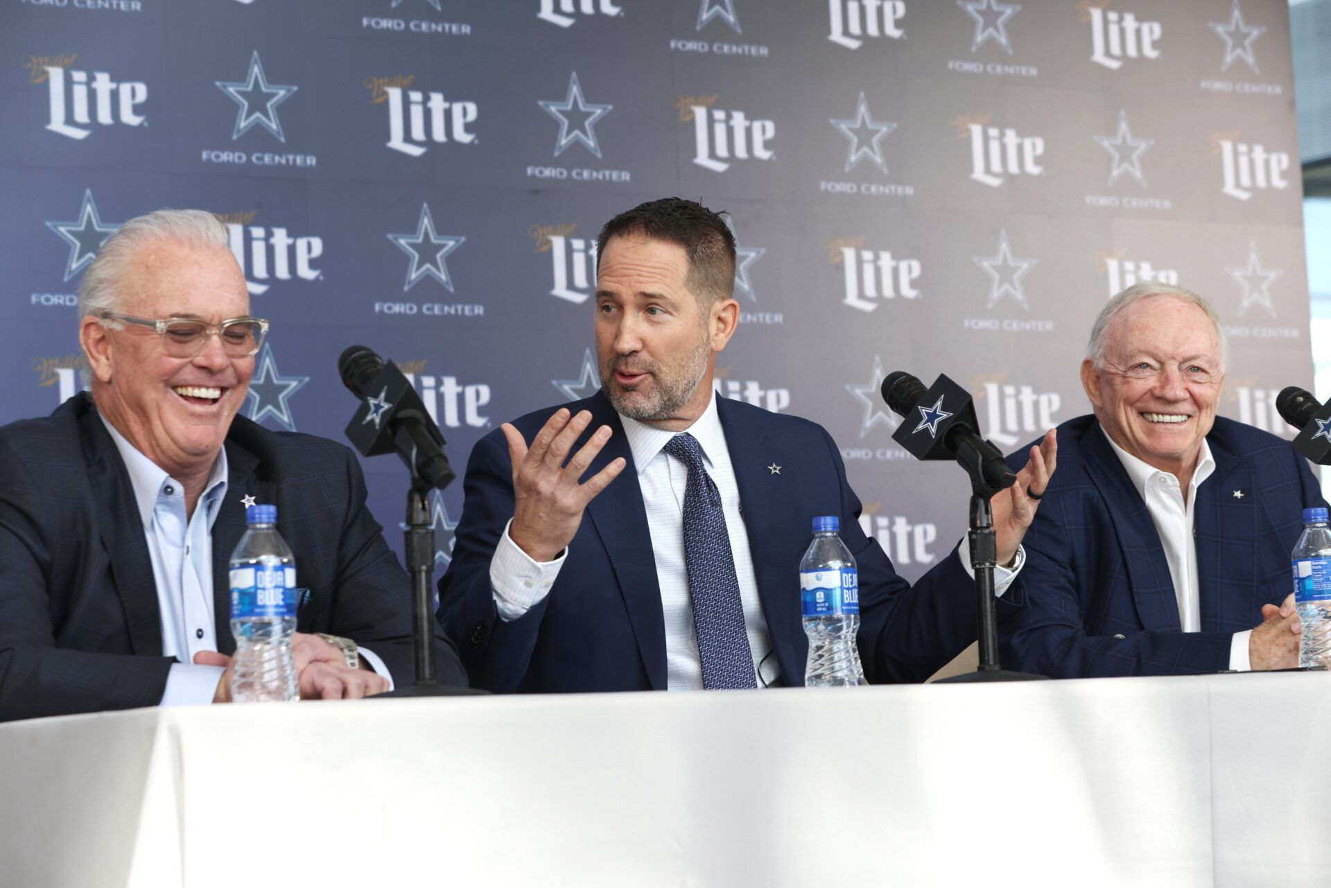 (L to R) Dallas Cowboys CEO Stephen Jones, head coach Brian Schottenheimer and owner Jerry Jones speak to the media at a press conference at the Star.