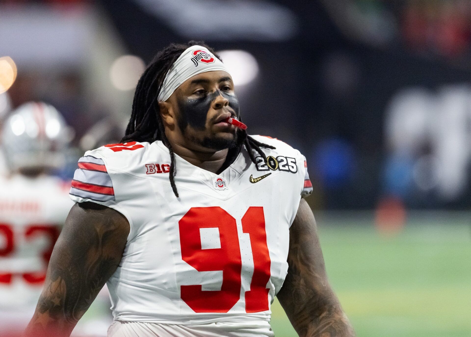 Ohio State Buckeyes defensive tackle Tyleik Williams (91) against the Notre Dame Fighting Irish during the CFP National Championship college football game at Mercedes-Benz Stadium.