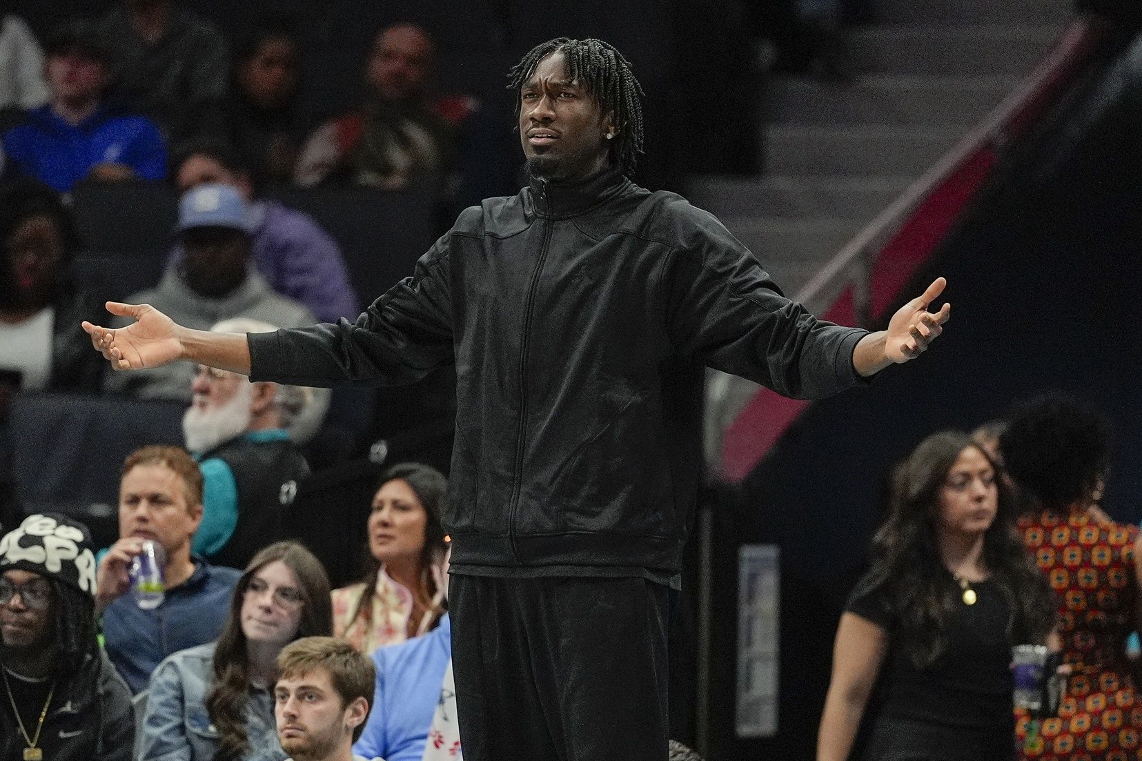 Injured Charlotte Hornets center Mark Williams (5) reacts to a call during the second half against the Brooklyn Nets at Spectrum Center.