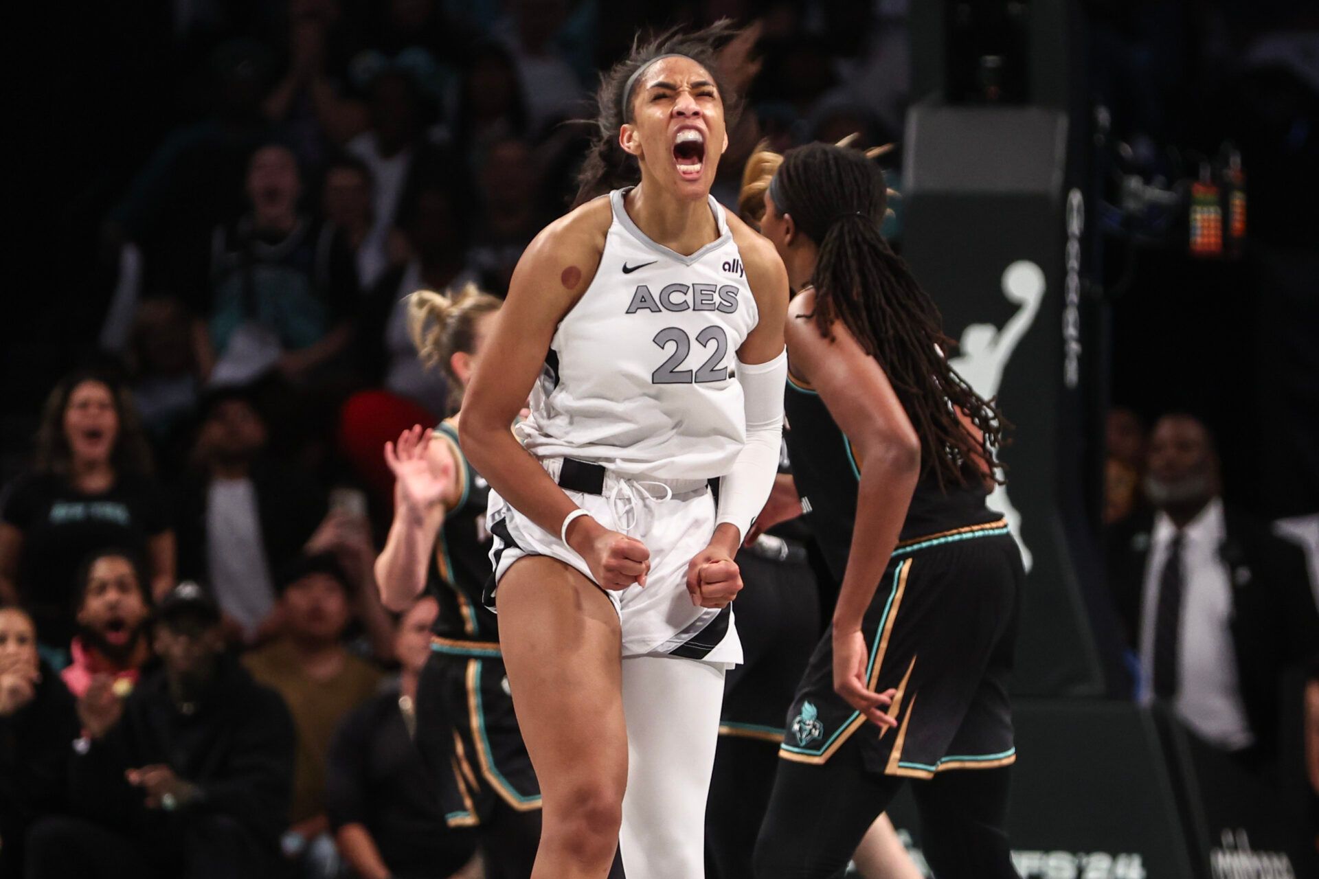 Oct 1, 2024; Brooklyn, New York, USA; Las Vegas Aces center A'ja Wilson (22) reacts after missing a jump shot in the fourth quarter during game two of the 2024 WNBA Semi-finals against the New York Liberty at Barclays Center. Mandatory Credit: Wendell Cruz-Imagn Images