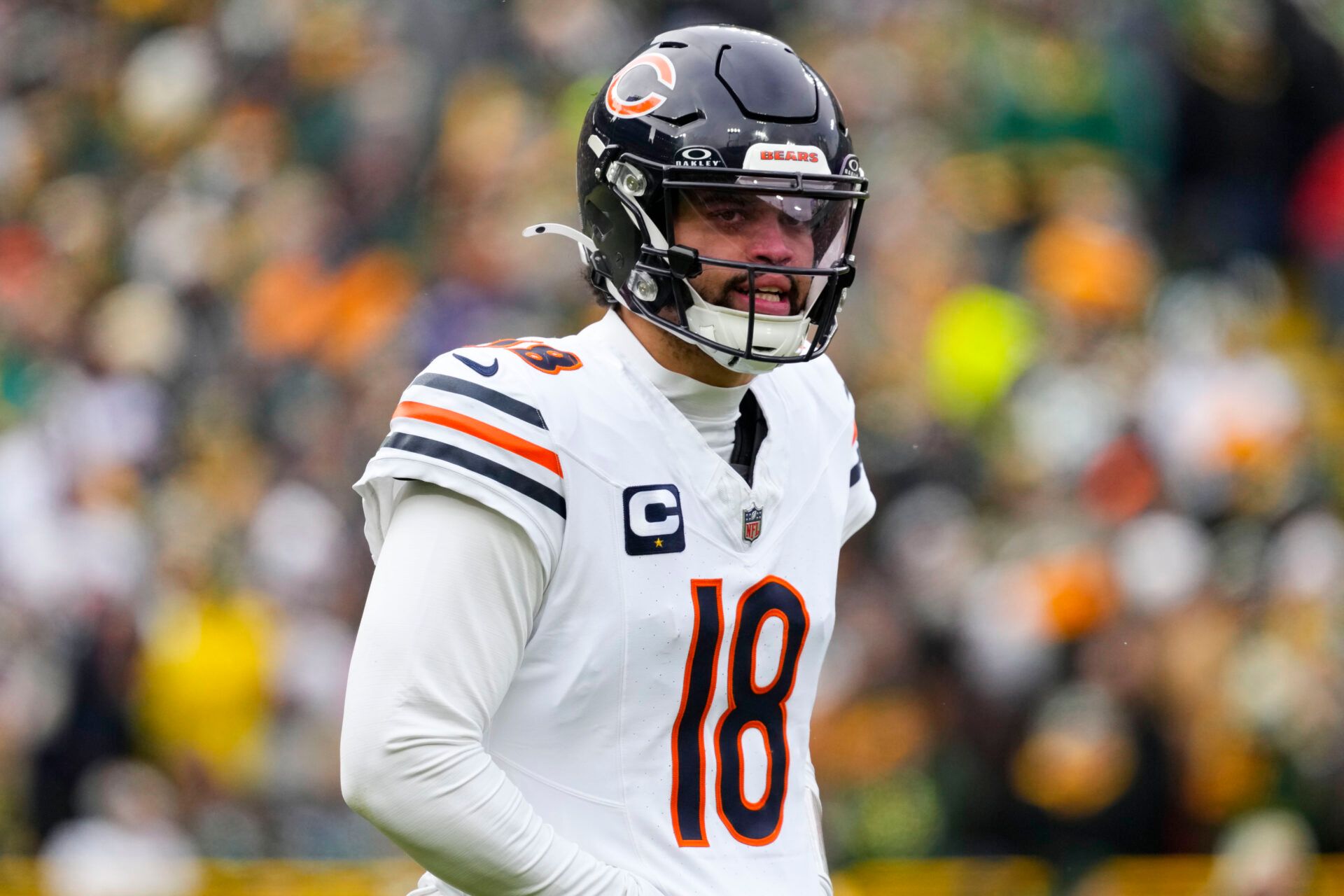 Jan 5, 2025; Green Bay, Wisconsin, USA; Chicago Bears quarterback Caleb Williams (18) during the game against the Chicago Bears at Lambeau Field. Mandatory Credit: Jeff Hanisch-Imagn Images