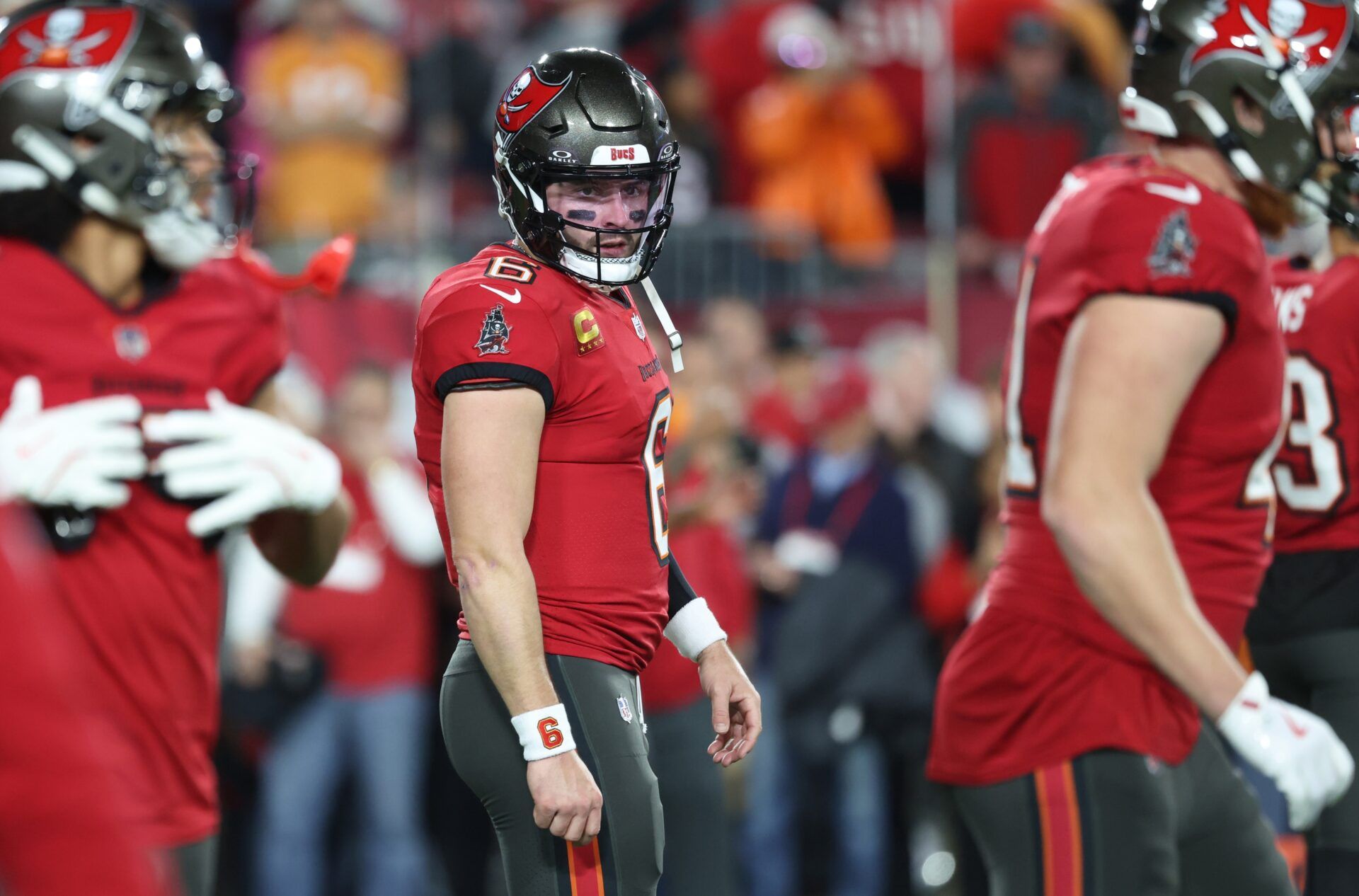 Tampa Bay Buccaneers quarterback Baker Mayfield (6) warms up before a NFC wild card playoff against the Washington Commanders at Raymond James Stadium.