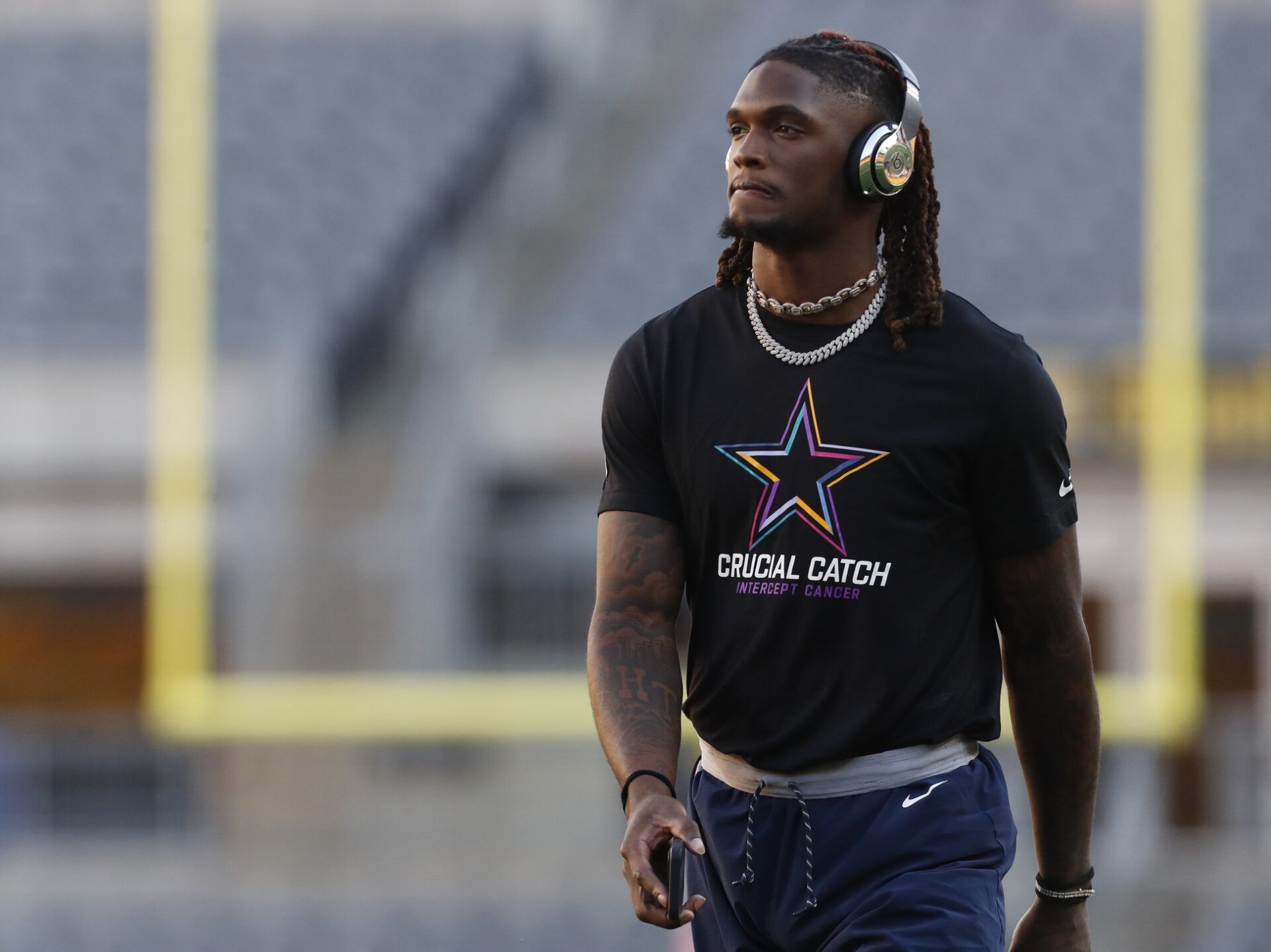 Dallas Cowboys wide receiver CeeDee Lamb (88) walks the field before a game against the Pittsburgh Steelers at Acrisure Stadium.