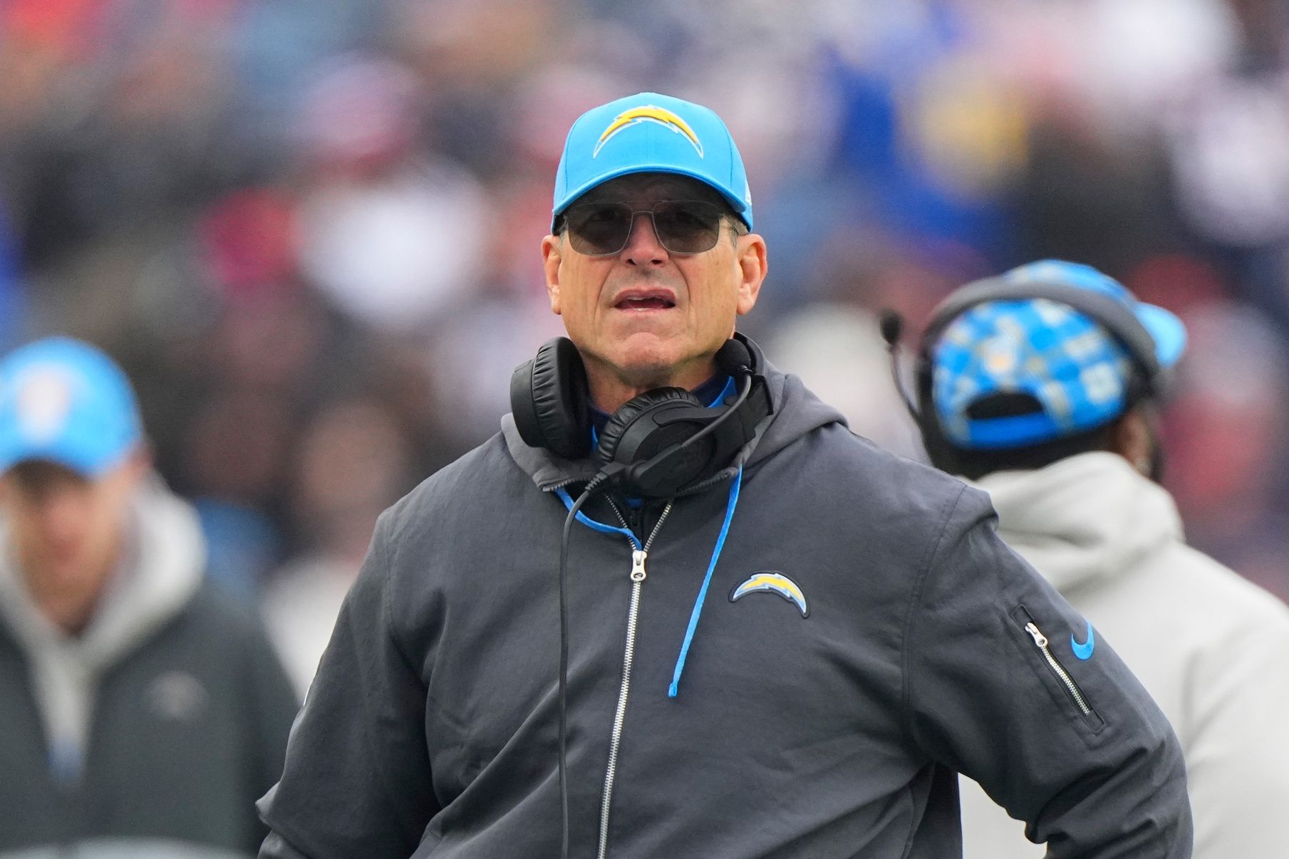 Los Angeles Chargers head coach Jim Harbaugh looks on from the sidelines during the first half against the New England Patriots at Gillette Stadium.