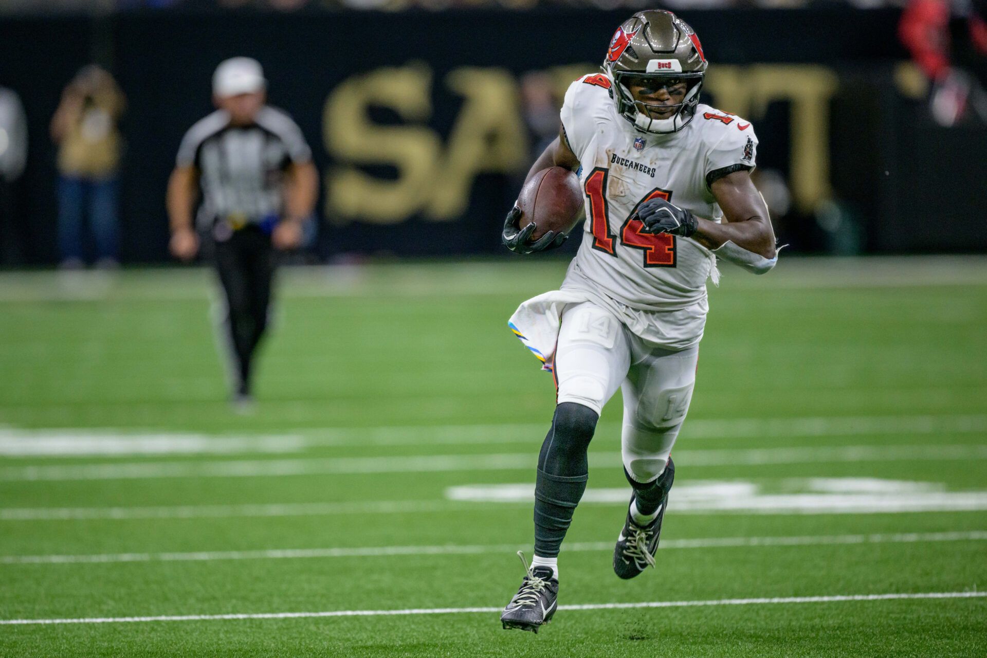 Oct 13, 2024; New Orleans, Louisiana, USA; Tampa Bay Buccaneers wide receiver Chris Godwin (14) runs in for a touchdown during the third quarter against the New Orleans Saints at Caesars Superdome. Mandatory Credit: Matthew Hinton-Imagn Images