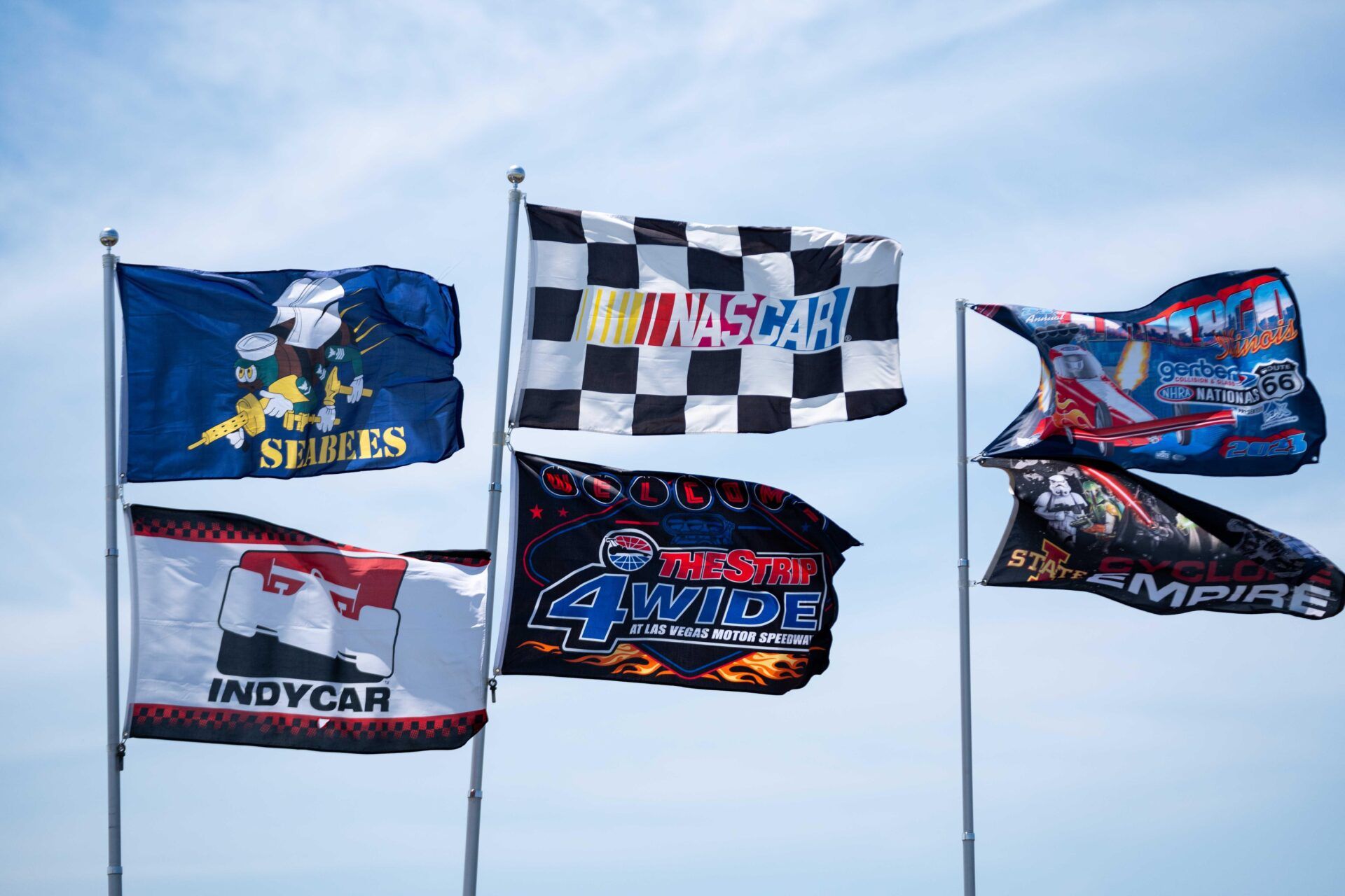 Fans fly flags from their campers during the Iowa Corn 350 on Sunday, June 16, 2024, at the Iowa Speedway in Newton.