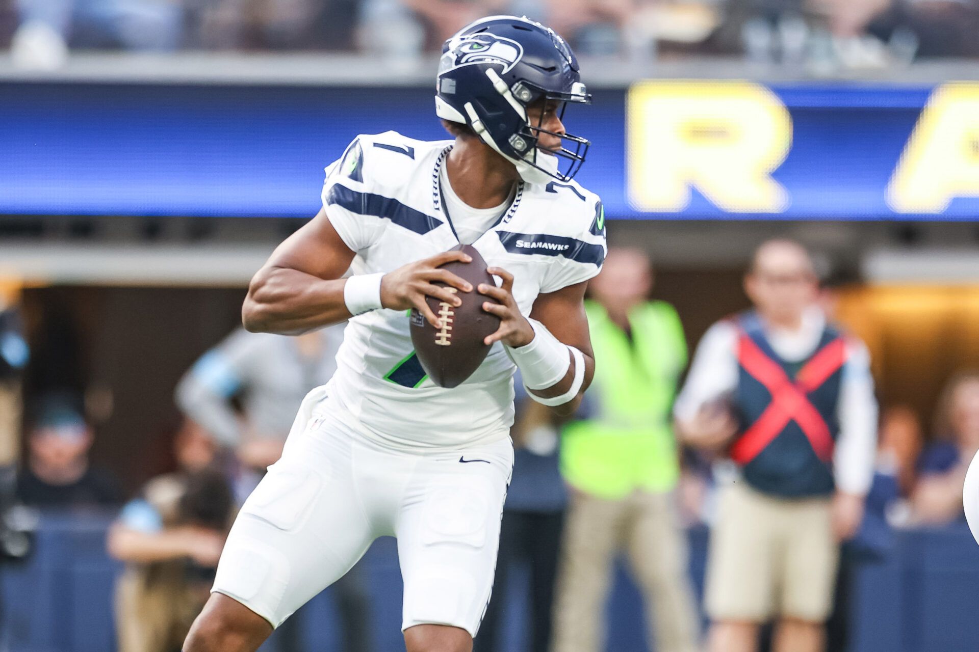 Jan 5, 2025; Inglewood, California, USA; Seattle Seahawks Geno Smith (7) in the pocket during the 1st quarter versus the Los Angeles Rams at SoFi Stadium. Mandatory Credit: William Navarro-Imagn Images