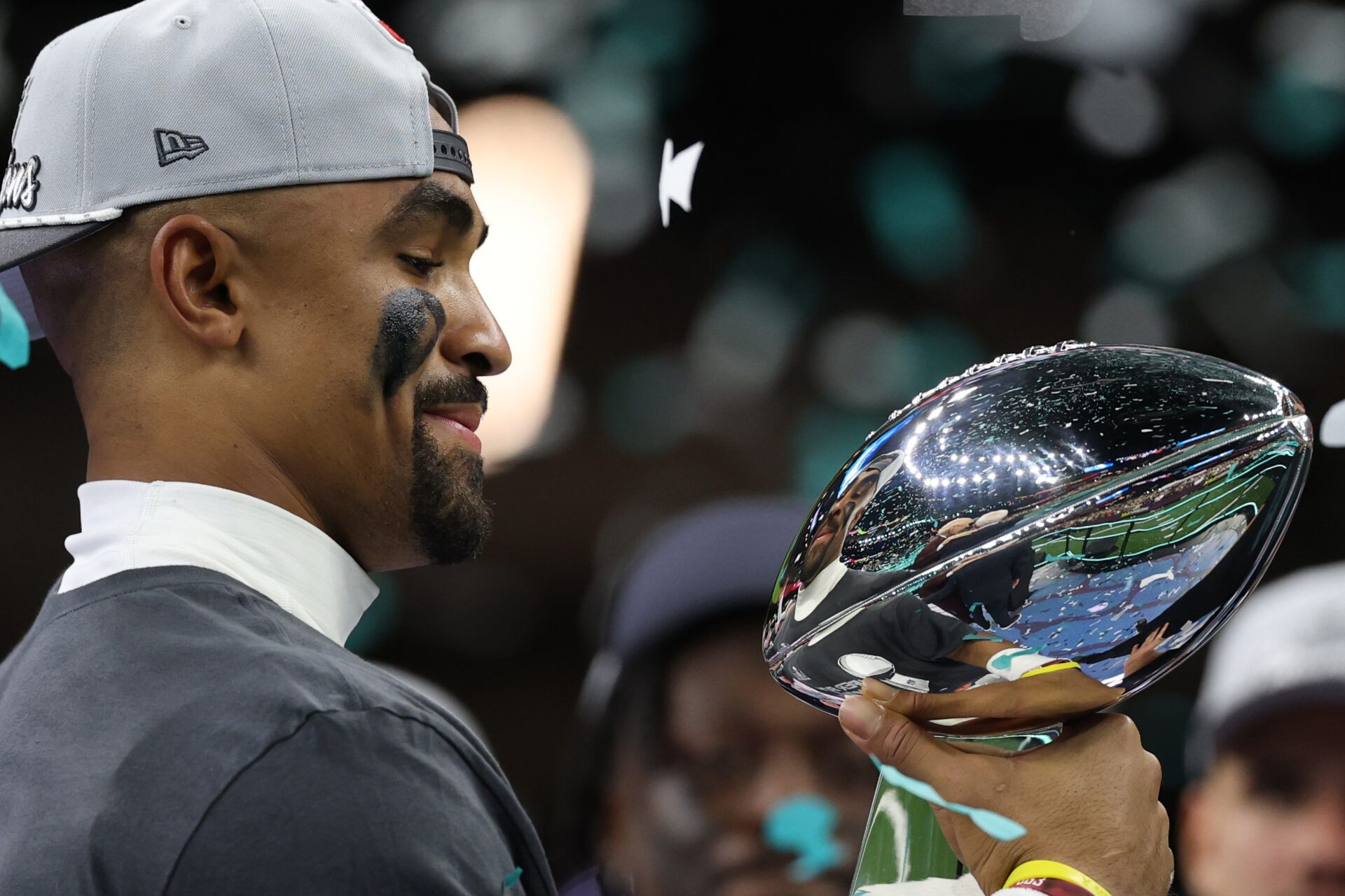 Feb 9, 2025; New Orleans, LA, USA; Philadelphia Eagles quarterback Jalen Hurts holds the Lombardi Trophy during the championship trophy presentation after the Eagles' game against the Kansas City Chiefs in Super Bowl LIX at Caesars Superdome. Mandatory Credit: Geoff Burke-Imagn Images