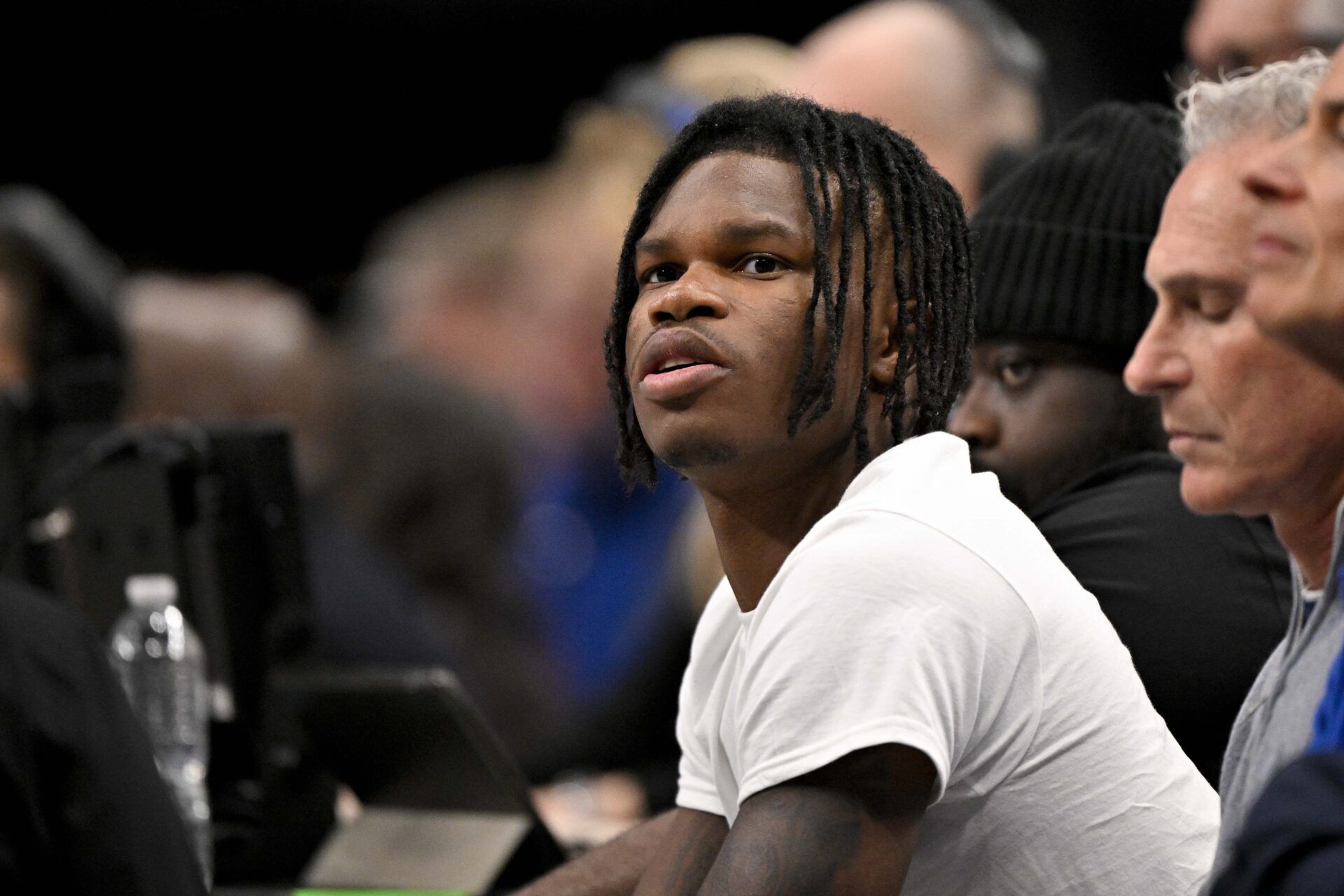 2024 Heisman Trophy winner Travis Hunter Jr. looks during the first half of the game between the Dallas Mavericks and the Minnesota Timberwolves at the American Airlines Center.