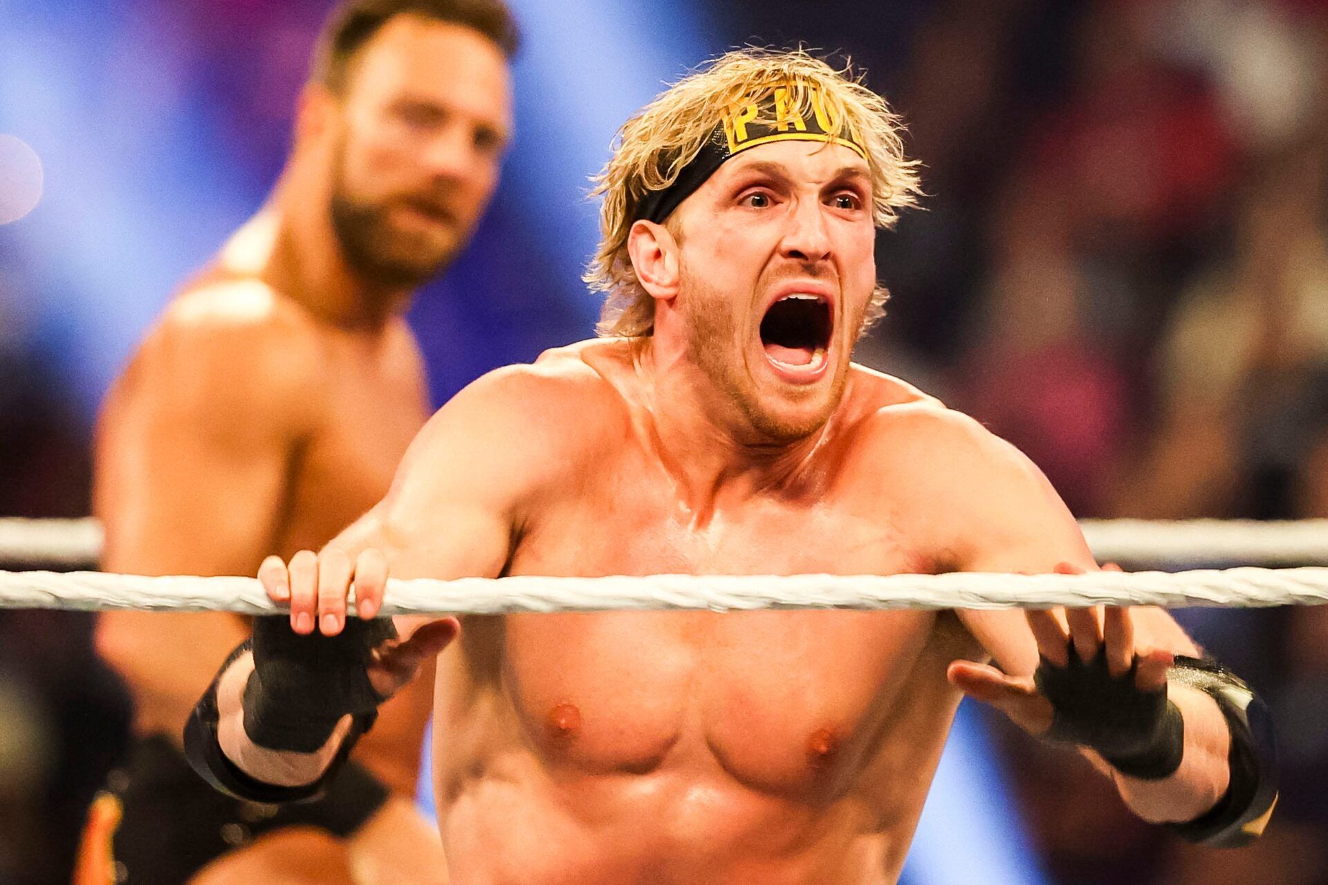 Logan Paul yells in celebration Saturday, Feb. 1, 2025, during the WWE Royal Rumble at Lucas Oil Stadium in Indianapolis.