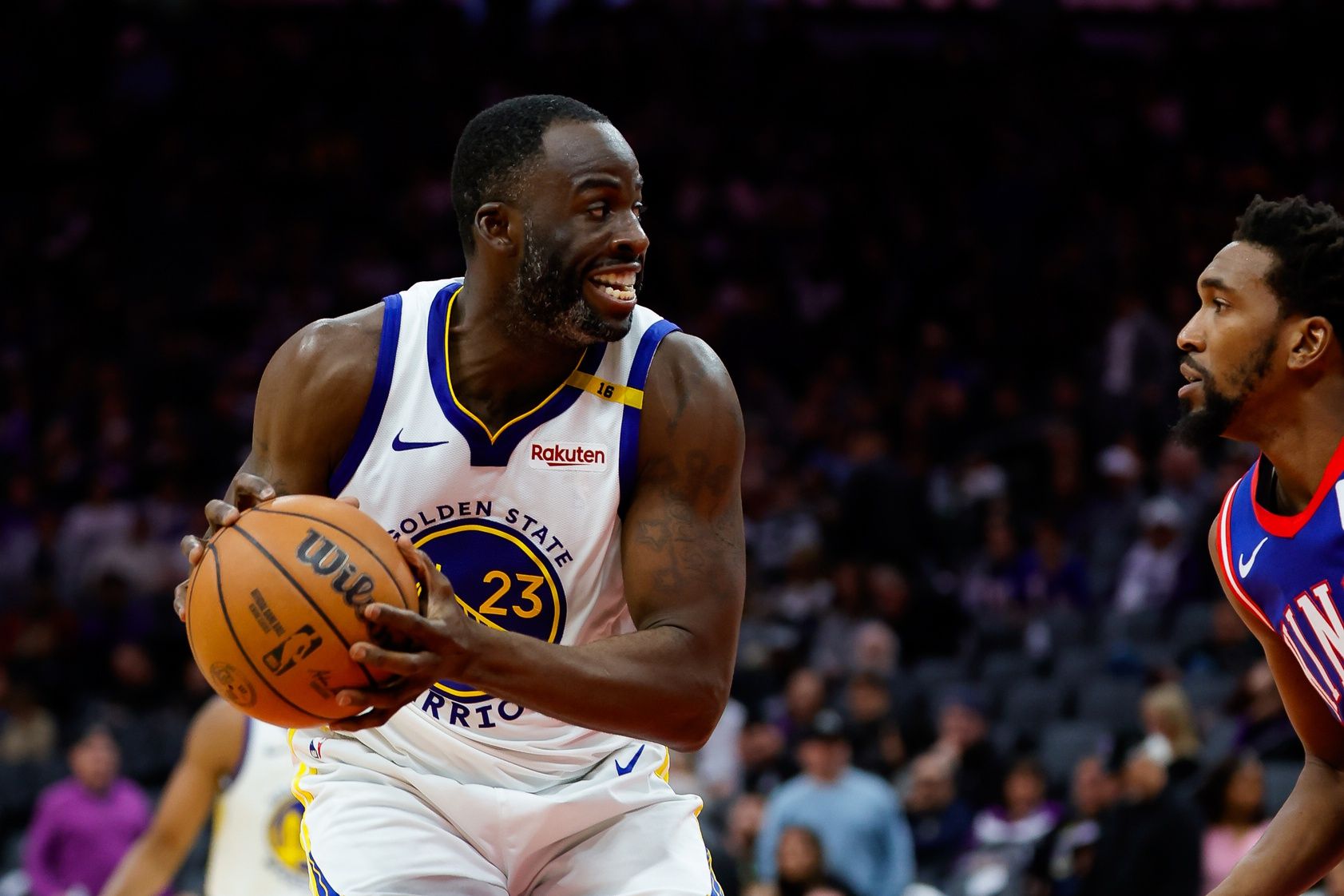 Golden State Warriors forward Draymond Green (23) drives to the basket against Sacramento Kings guard Malik Monk (0) during the third quarter at Golden 1 Center.