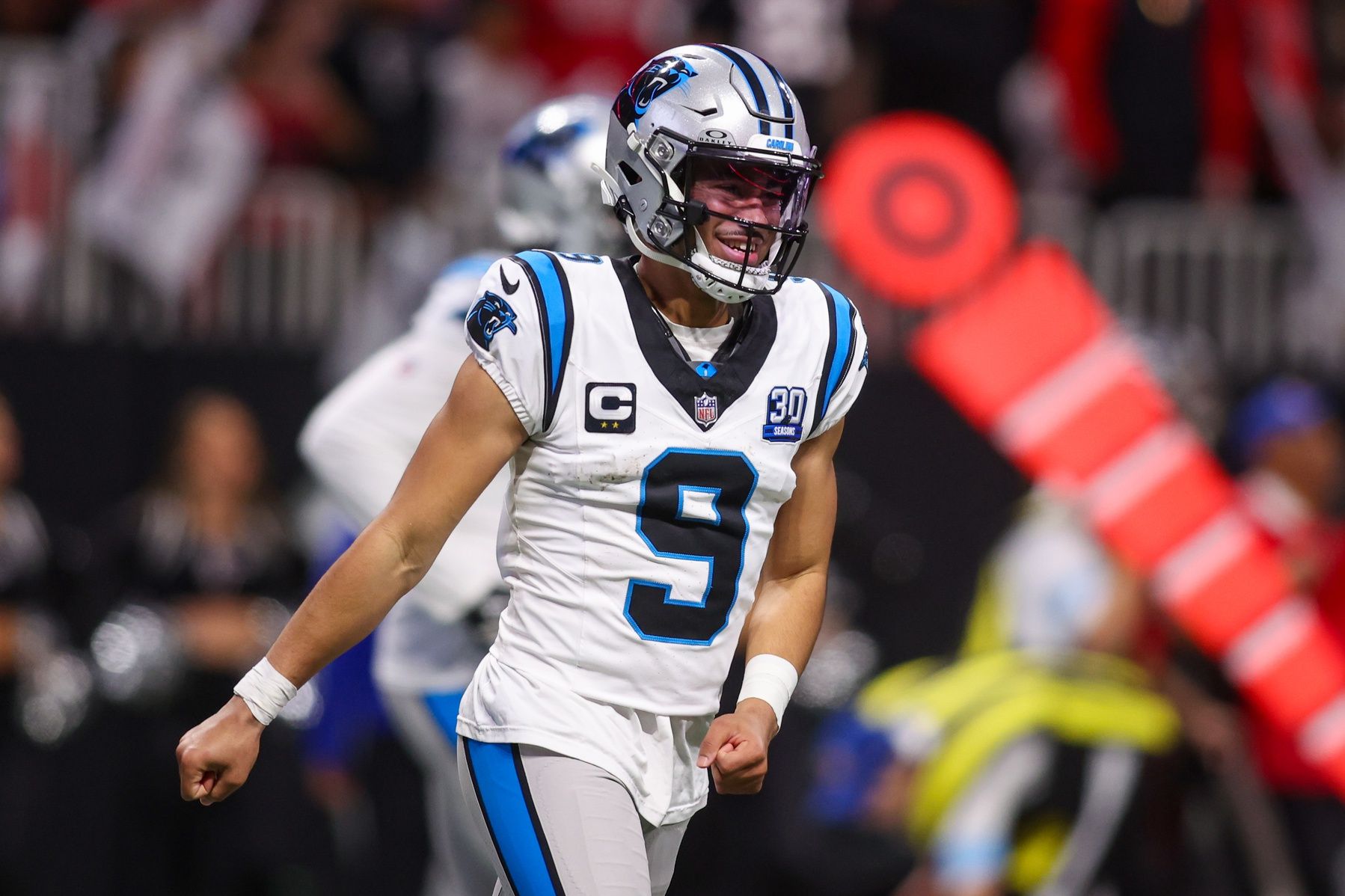 Carolina Panthers quarterback Bryce Young (9) celebrates after a touchdown against the Atlanta Falcons in the fourth quarter at Mercedes-Benz Stadium.