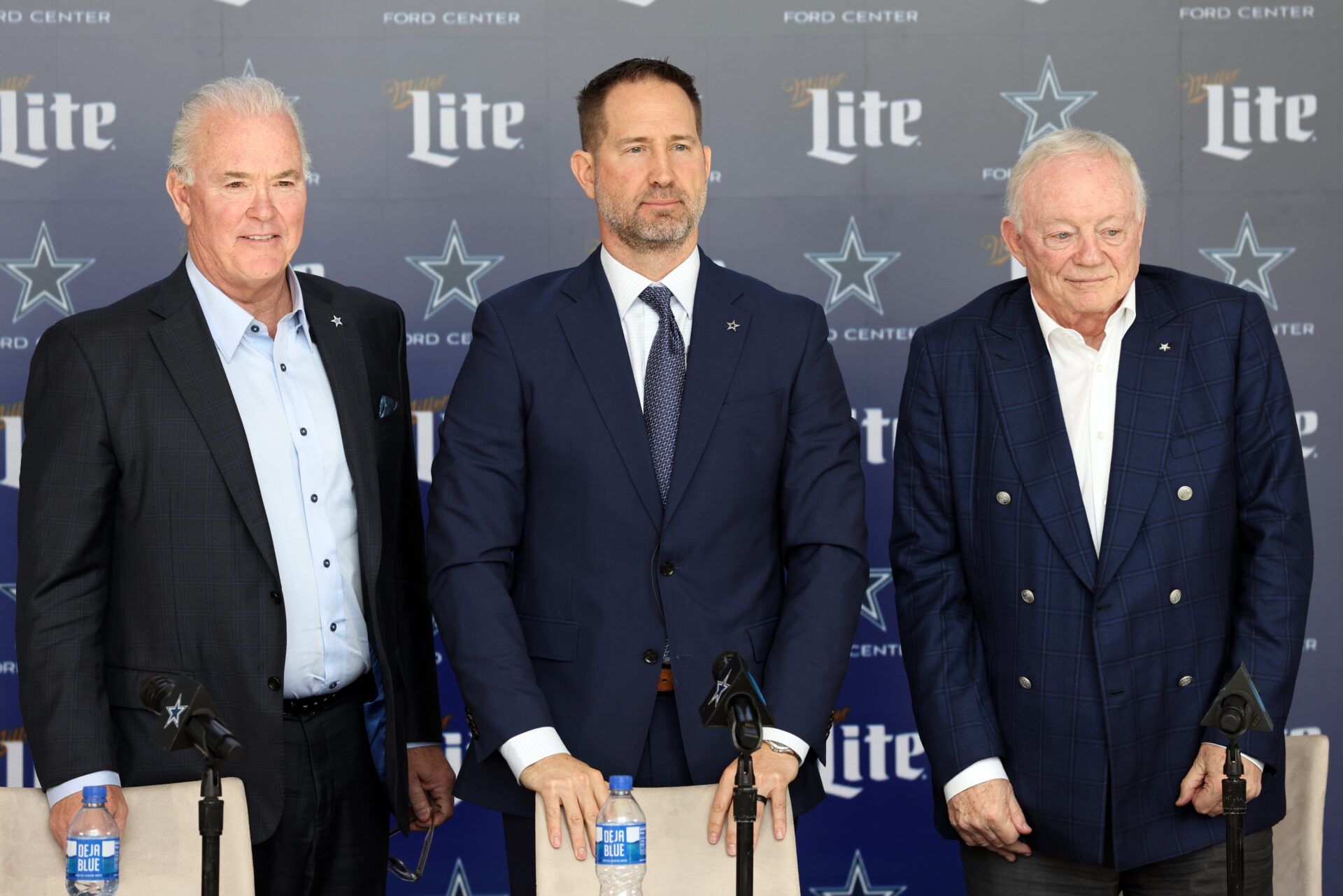 (L to R) Dallas Cowboys CEO Stephen Jones, head coach Brian Schottenheimer and owner Jerry Jones pose for pictures after a press conference at the Star.