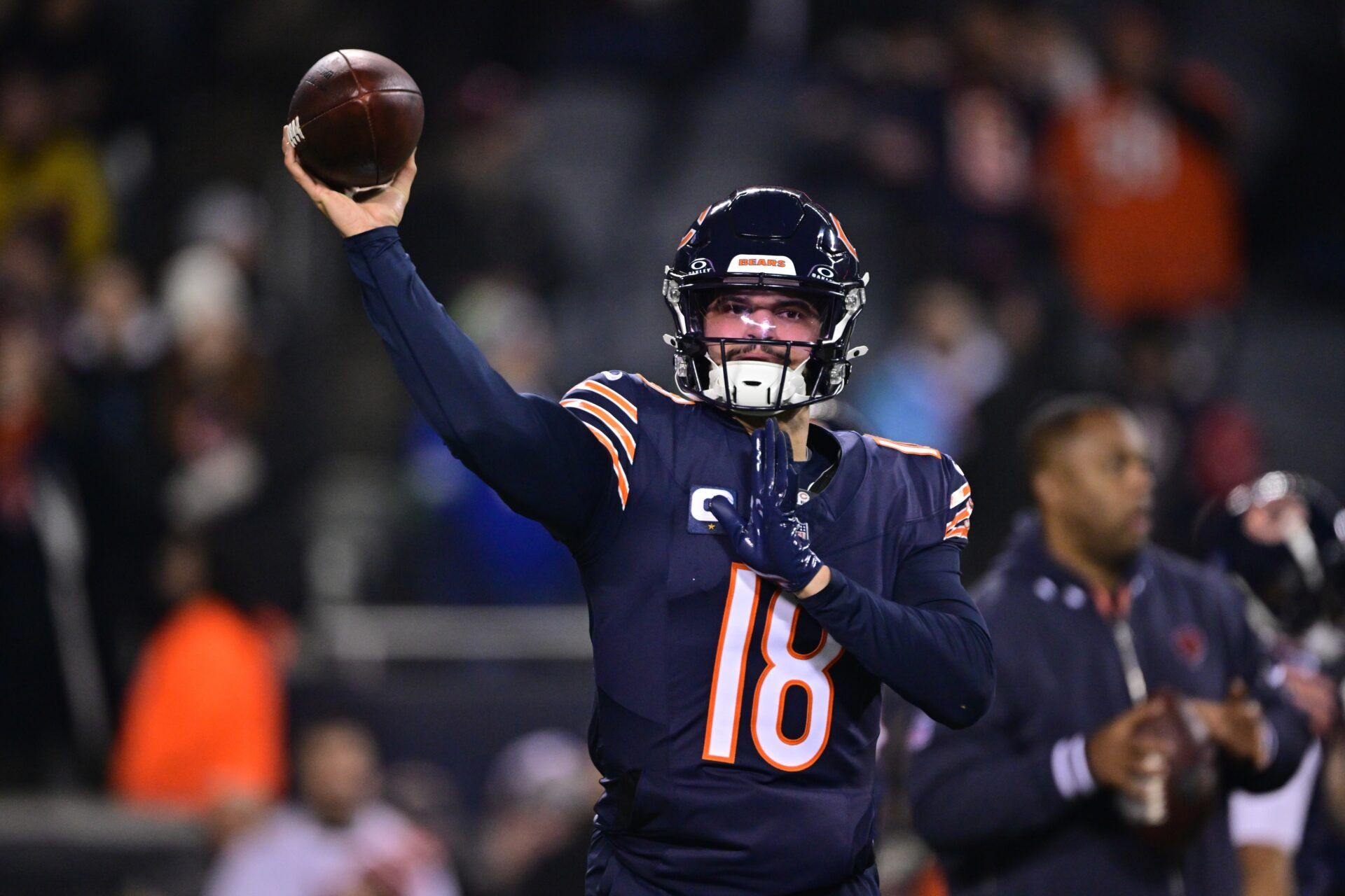 Chicago Bears quarterback Caleb Williams (18) warms up before the game against the Seattle Seahawks at Soldier Field.