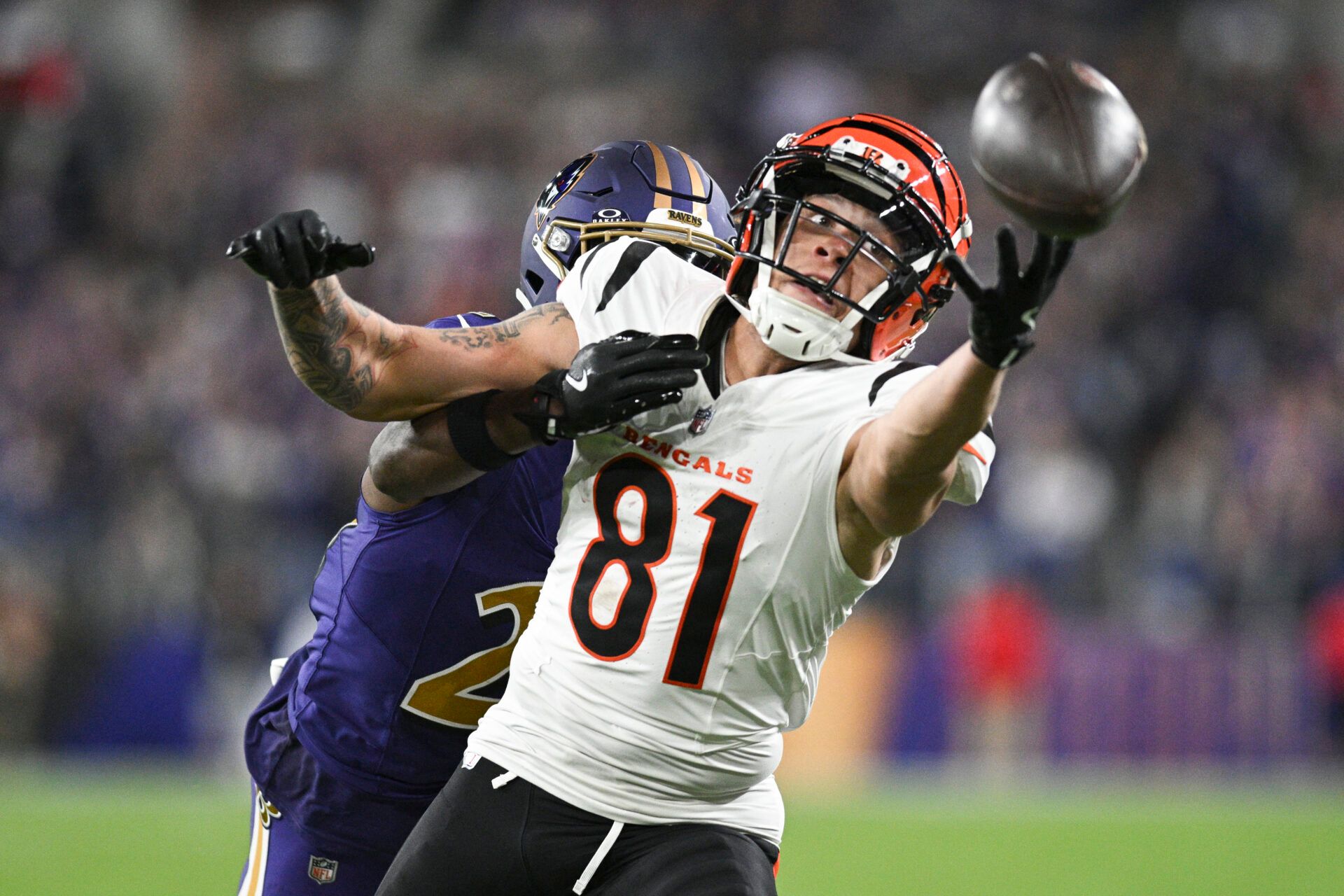 Nov 7, 2024; Baltimore, Maryland, USA; Cincinnati Bengals wide receiver Jermaine Burton (81) reaches for quarterback Joe Burrow (not pictured) throws ass Baltimore Ravens cornerback Brandon Stephens (21) defends during the second half at M&T Bank Stadium. Mandatory Credit: Tommy Gilligan-Imagn Images