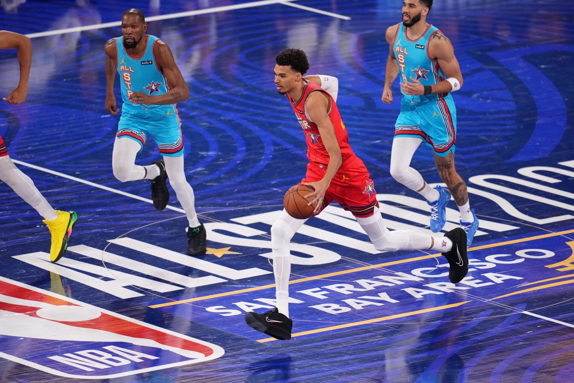 Chuck's Global Stars forward Victor Wembanyama (1) of the San Antonio Spurs dribbles the ball against Shaq's OGs during the 2025 NBA All Star Game at Chase Center.
