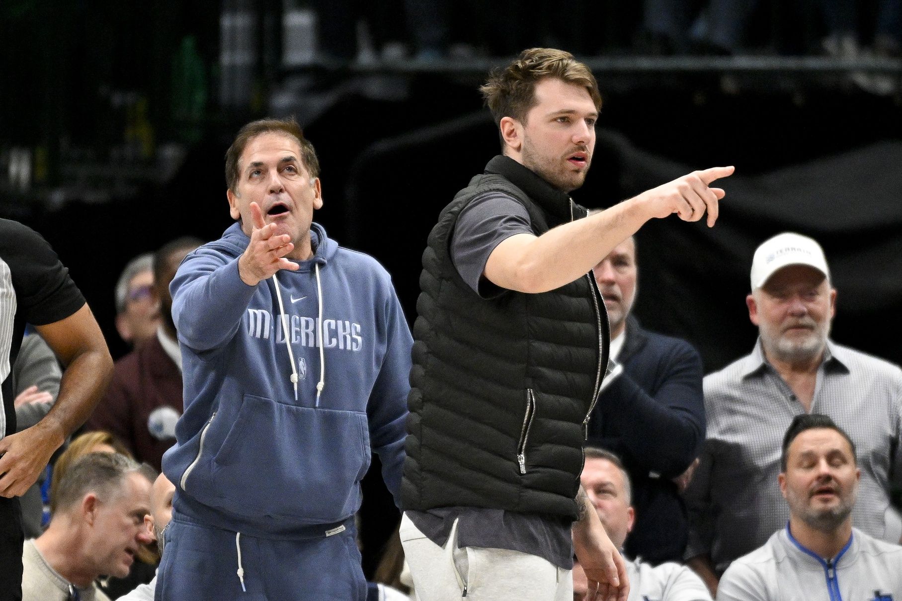 Ex-Dallas Mavericks guard Luka Doncic (right) and Mark Cuban (left) argue a call during the second half of the game against the New Orleans Pelicans at the American Airlines Center.