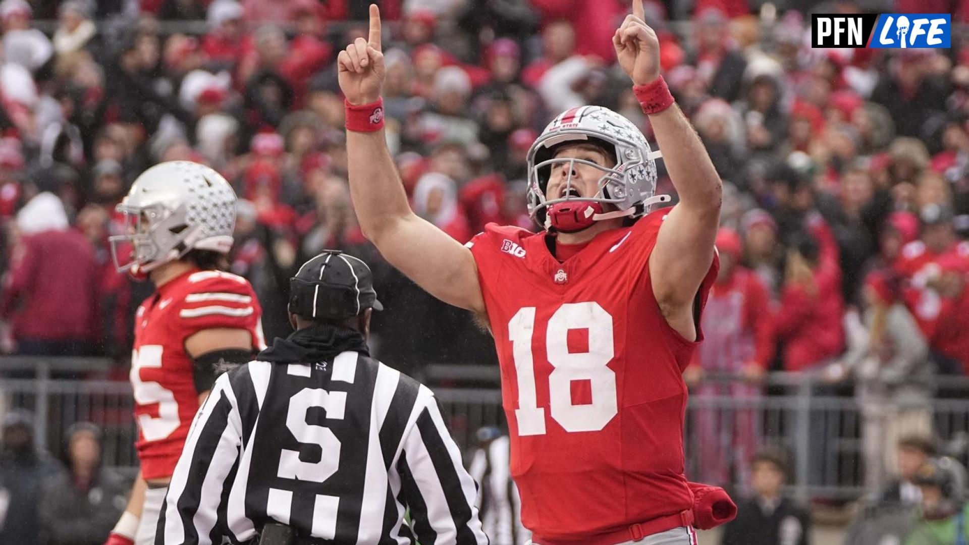 Ohio State Buckeyes quarterback Will Howard (18) celebrates a touchdown during the first half of the NCAA football game against the Indiana Hoosiers at Ohio Stadium in Columbus on Saturday, Nov. 23, 2024.