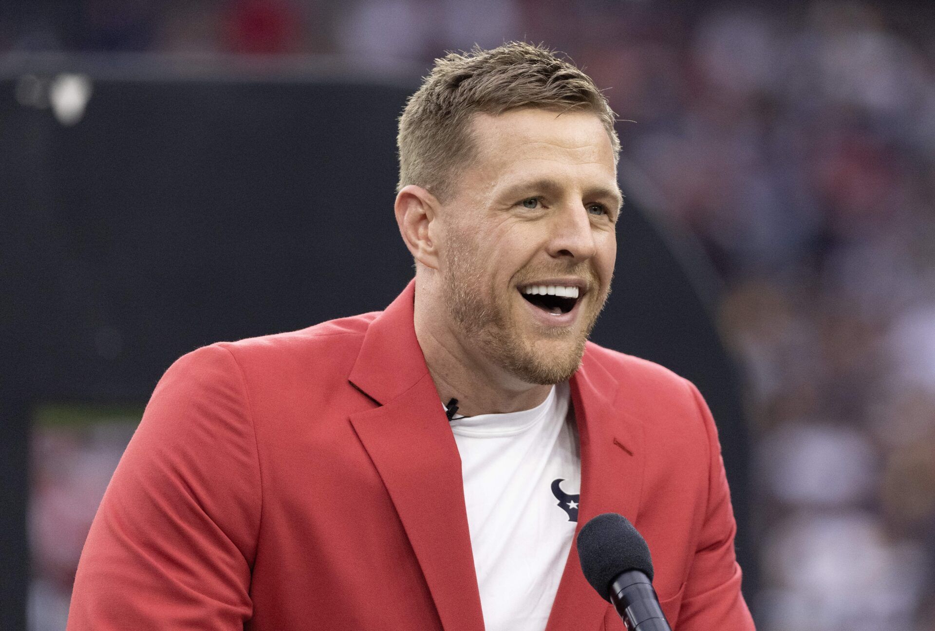 Former Houston Texans JJ Watt speaks to the fans during his Ring Of Honor Ceremony at halftime during the game between the Texans and Pittsburgh Steelers at NRG Stadium.