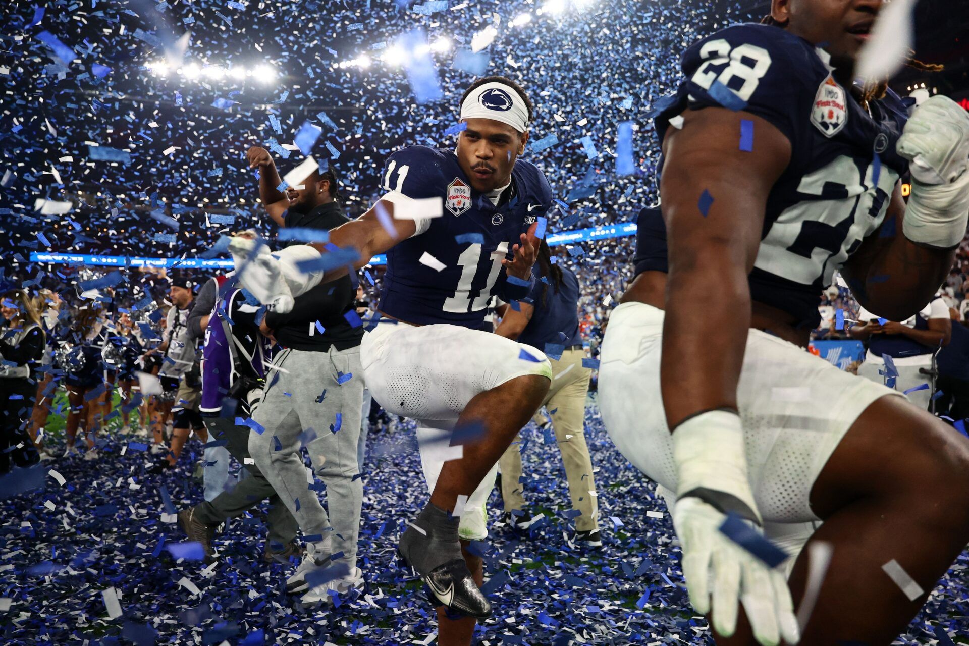 Penn State Nittany Lions defensive end Abdul Carter (11) reacts with teammates after defeating the Boise State Broncos in the Fiesta Bowl at State Farm Stadium.