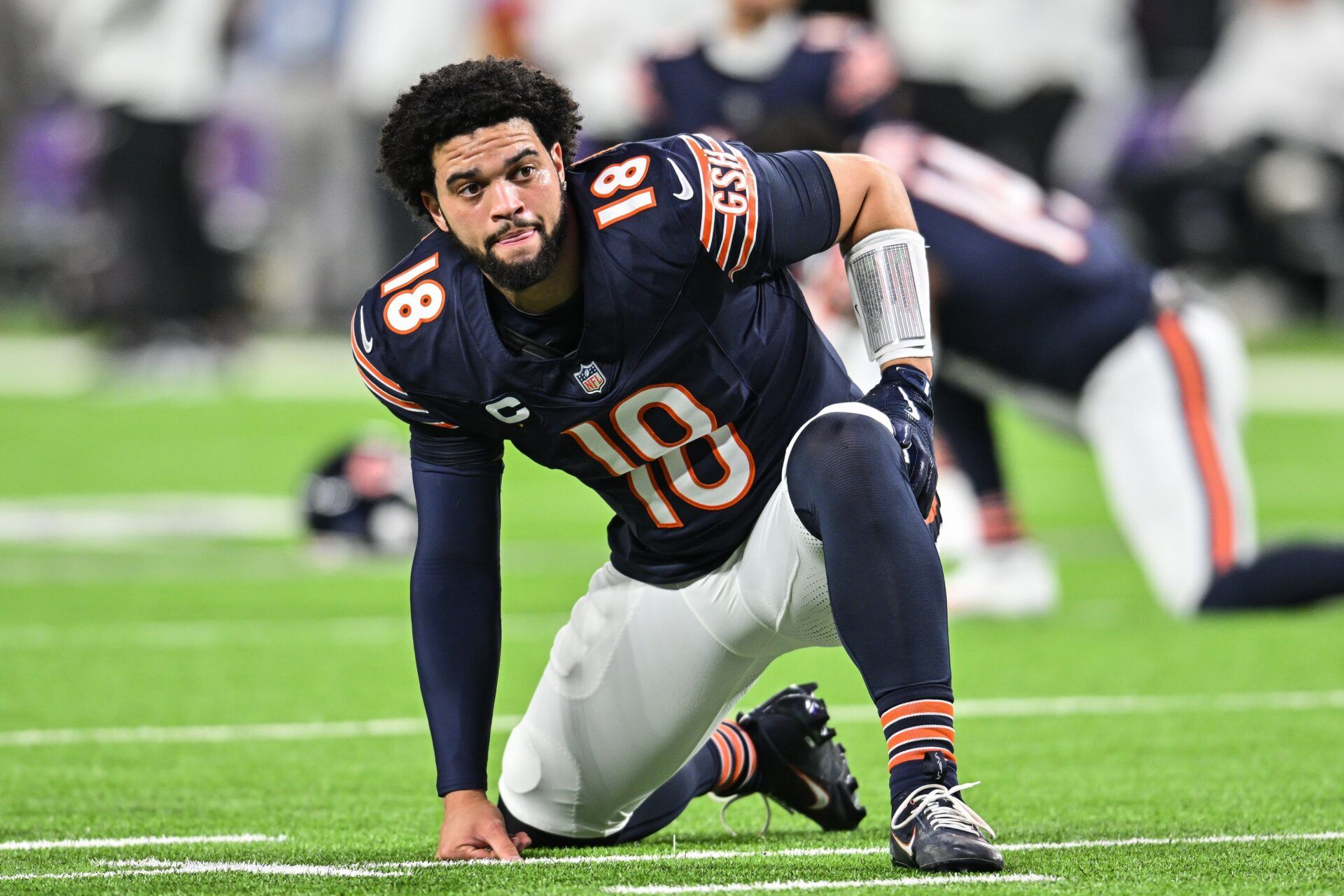 Chicago Bears quarterback Caleb Williams (18) looks on before the game against the Minnesota Vikings at U.S. Bank Stadium.