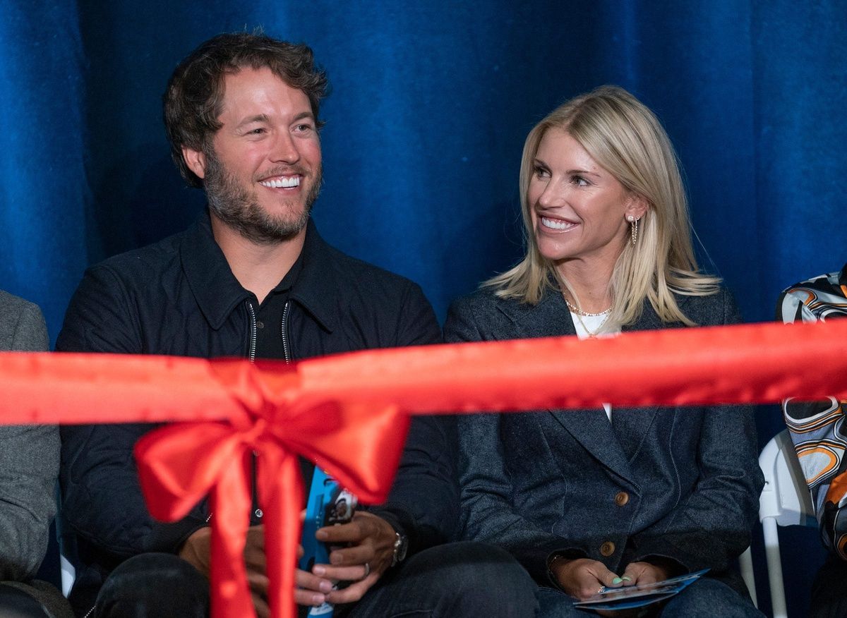 Mathew and Kelly Stafford share a laugh during speeches for the ribbon cutting of the Kelly and Matthew Stafford and Friends Education Center at the S.A.Y Detroit Play Center in Detroit on Monday, April 1, 2024.