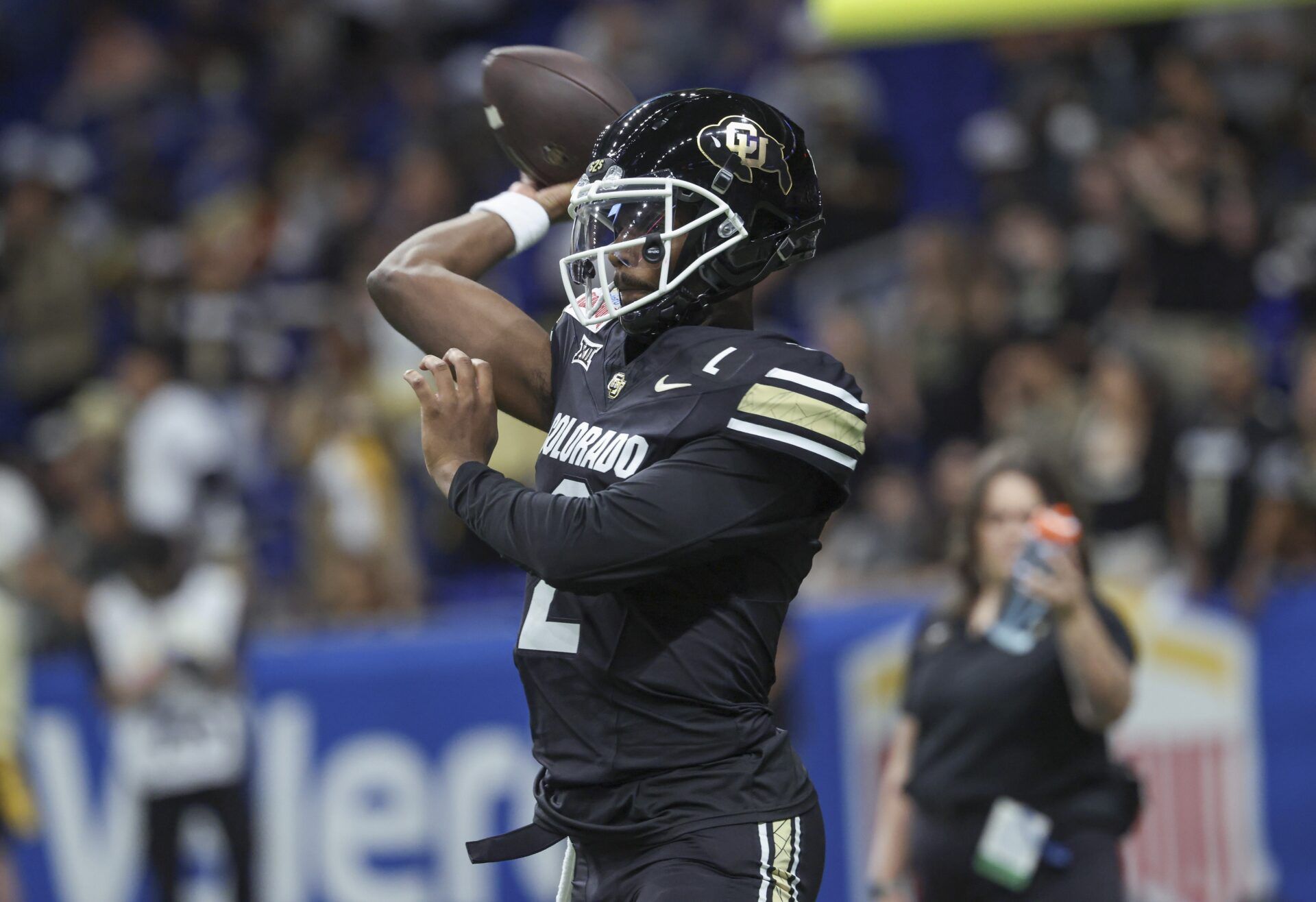 Colorado Buffaloes quarterback Shedeur Sanders (2) warms up before the game against the Brigham Young Cougars at Alamodome.