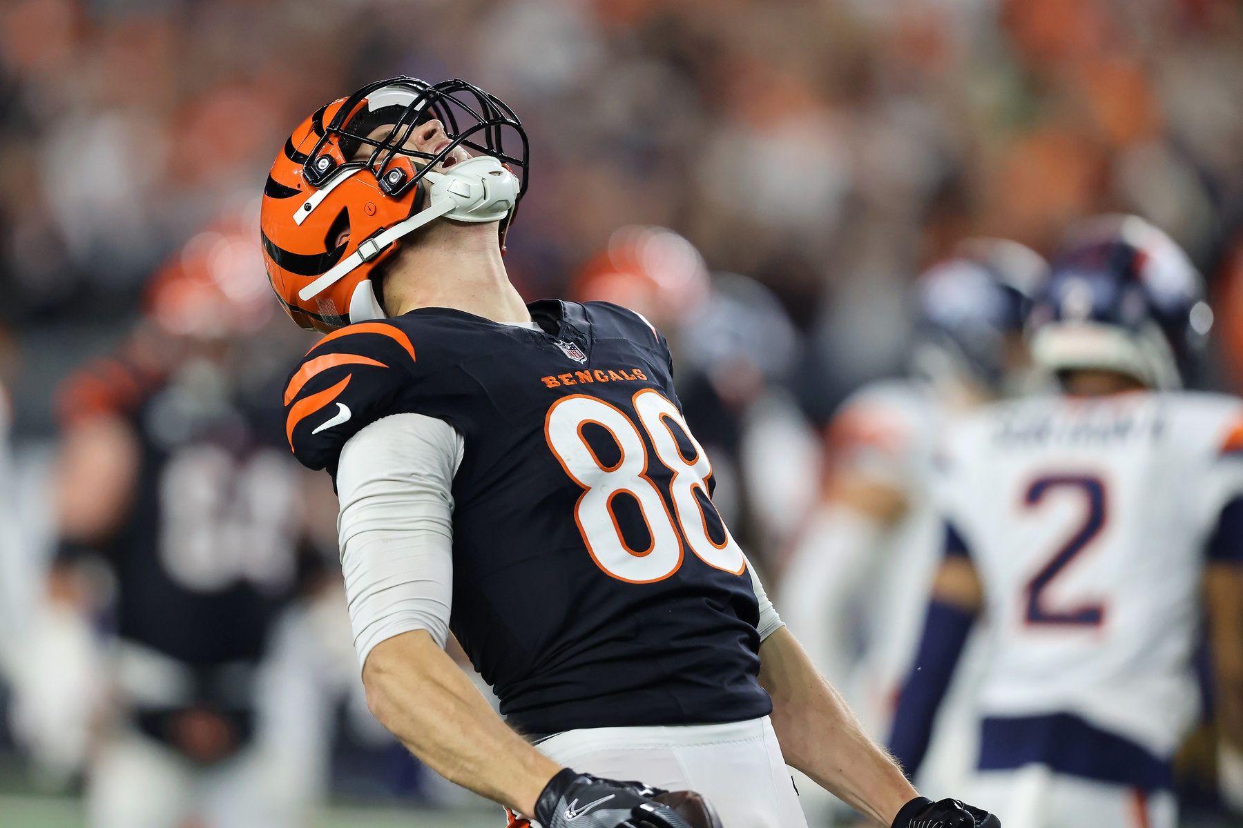 Cincinnati Bengals tight end Mike Gesicki (88) reacts after catching a first down pass in overtime against the Denver Broncos at Paycor Stadium.