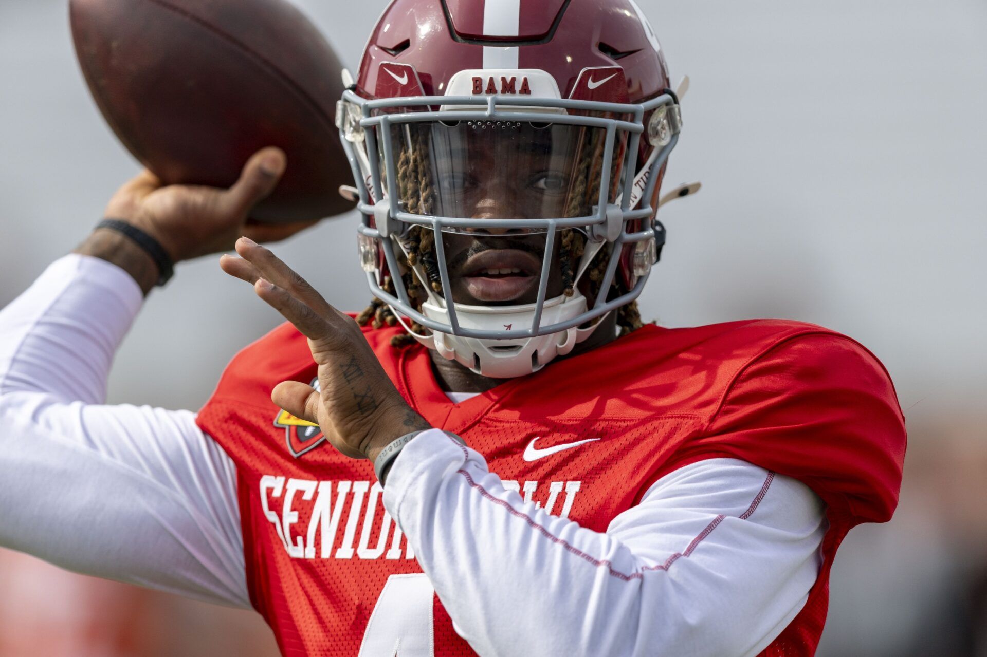 American team quarterback Jalen Milroe of Alabama (4) throws the ball during Senior Bowl practice for the American team at Hancock Whitney Stadium.