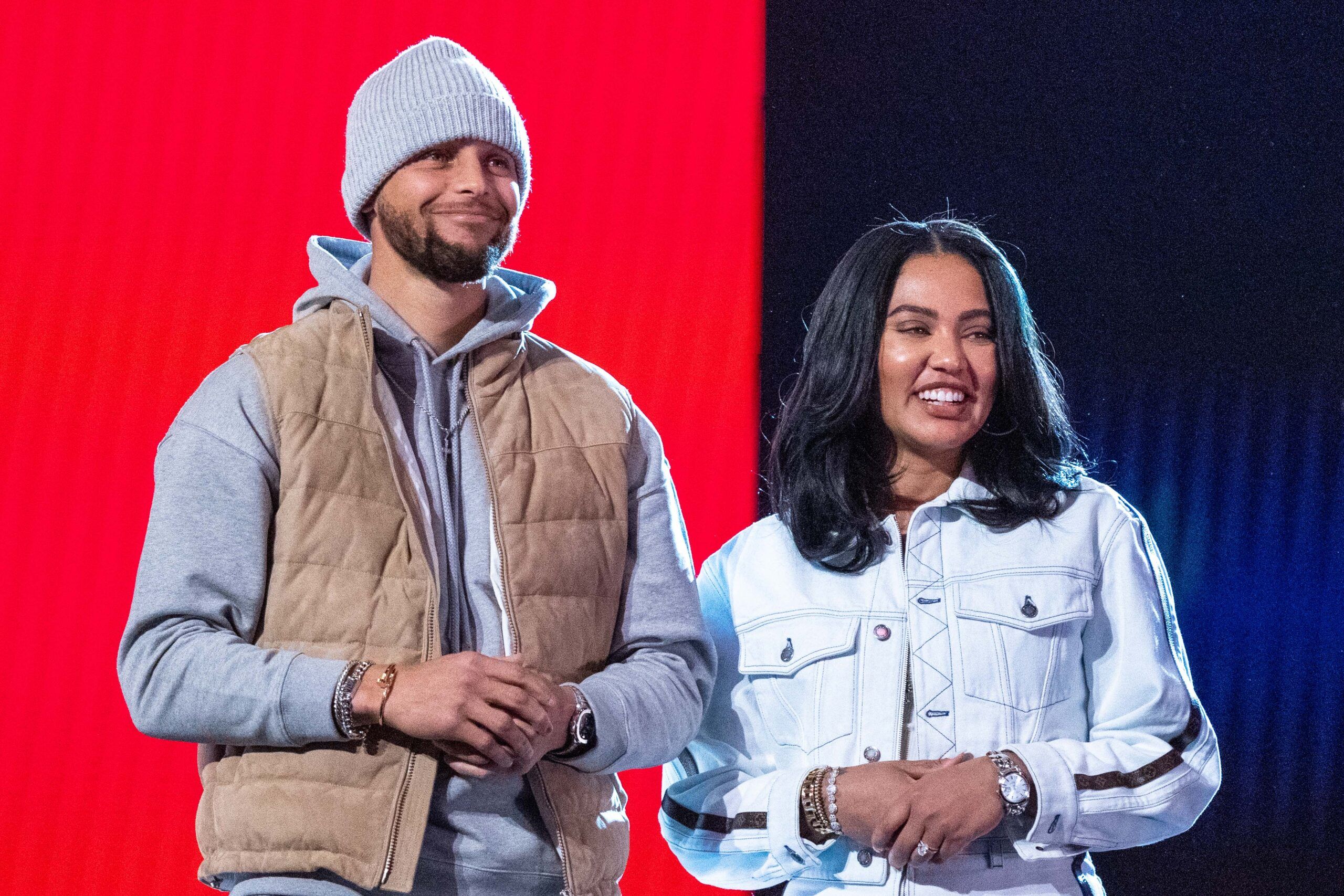 February 19, 2022; Cleveland, OH, USA; Golden State Warriors guard Stephen Curry (30) and wife Ayesha Curry (right) during the 2022 NBA All-Star Saturday Night at Rocket Mortgage FieldHouse. Mandatory Credit: Kyle Terada-USA TODAY Sports