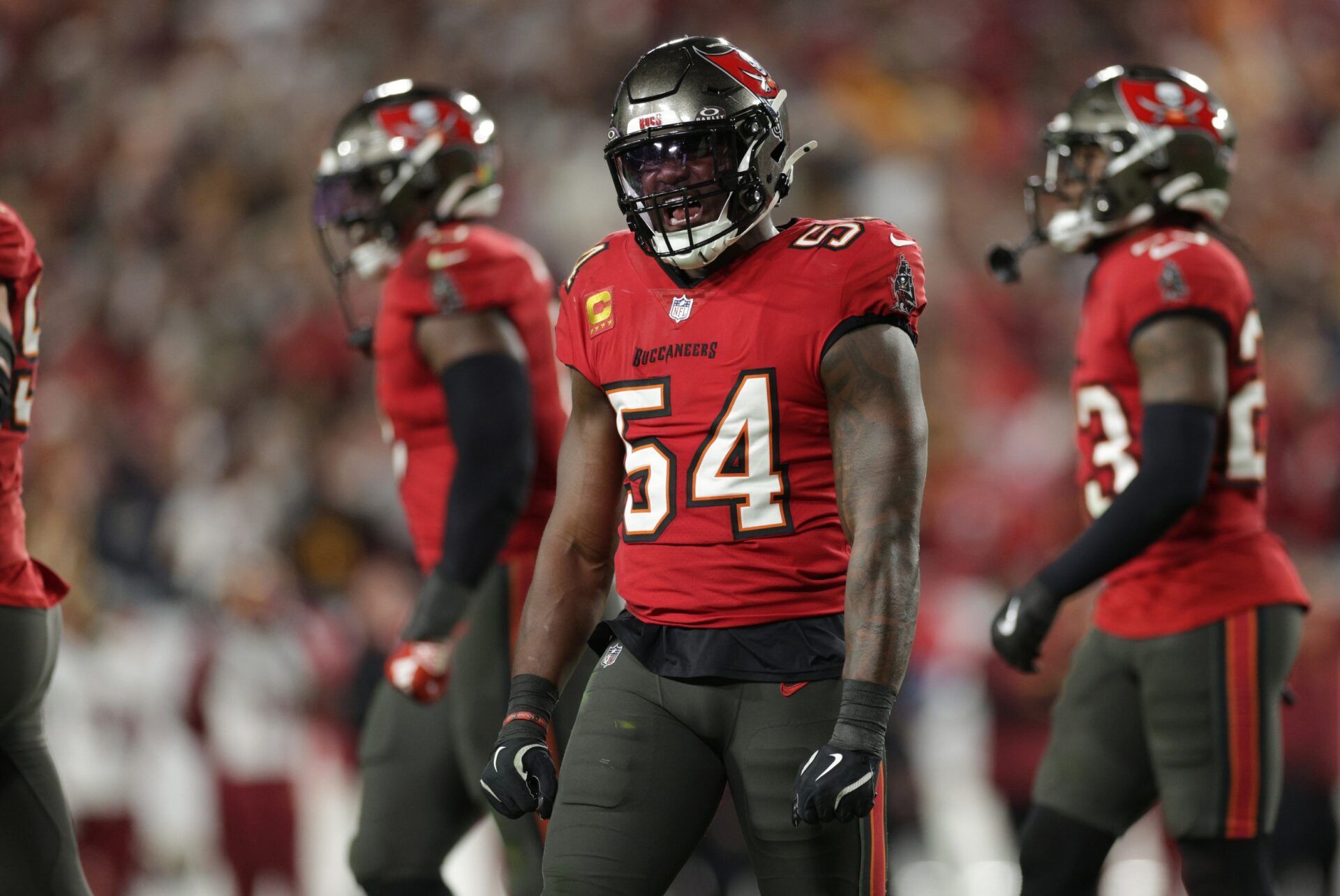 Tampa Bay Buccaneers linebacker Lavonte David (54) celebrates after a stop during the fourth quarter of a NFC wild card playoff against the Washington Commanders at Raymond James Stadium.