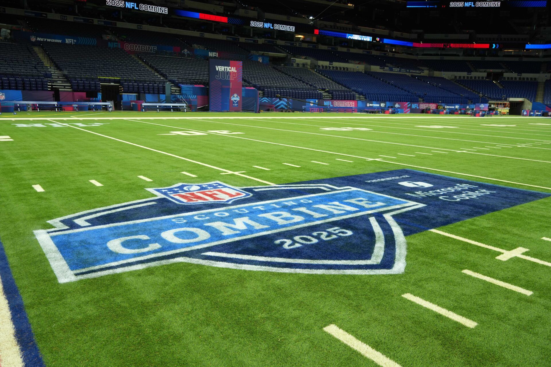 The 2025 NFL Scouting Combine logo on the field at Lucas Oil Stadium.