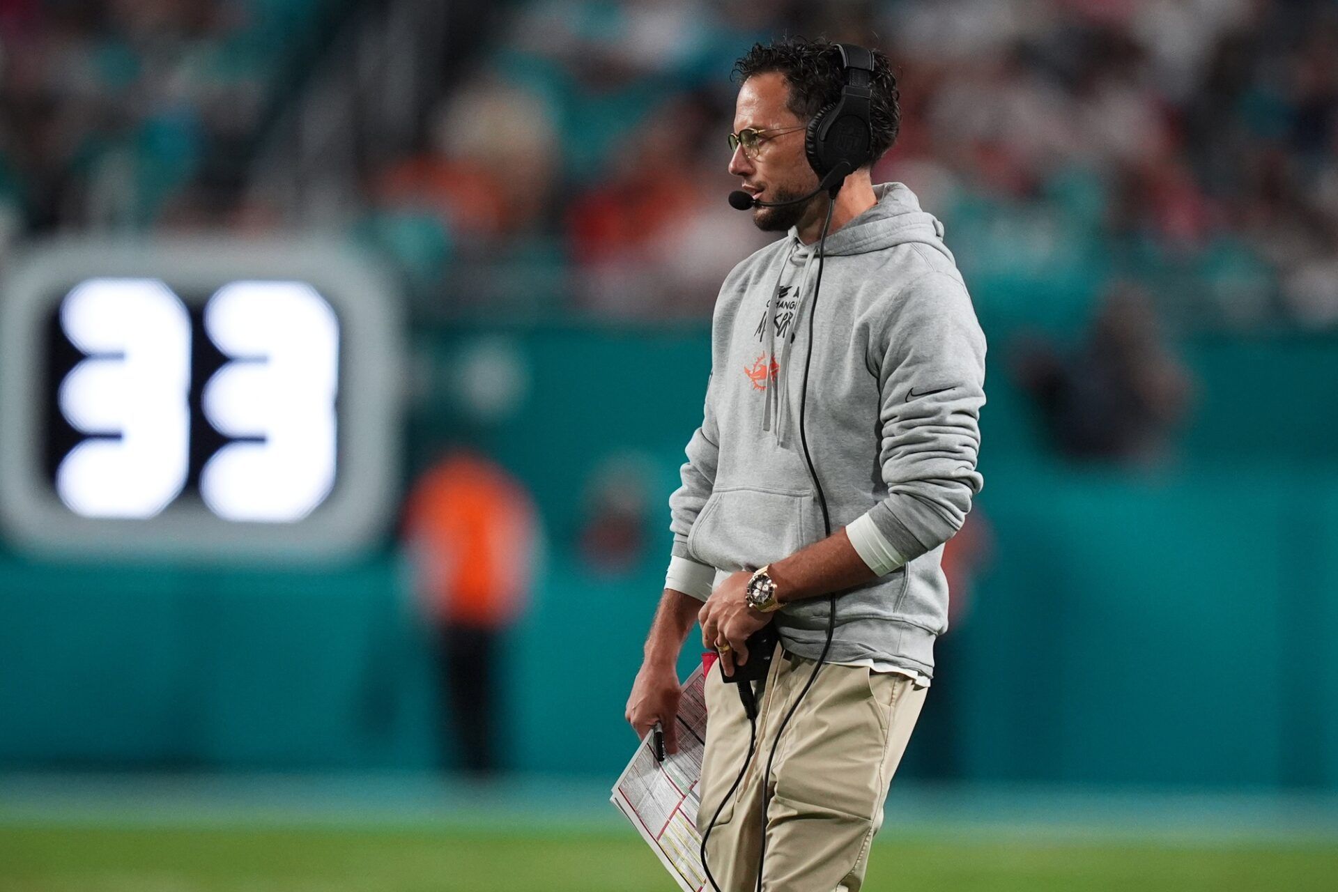 Miami Dolphins head coach Mike McDaniel walks onto the field during second half between the Miami Dolphins and the San Francisco 49ers at Hard Rock Stadium.