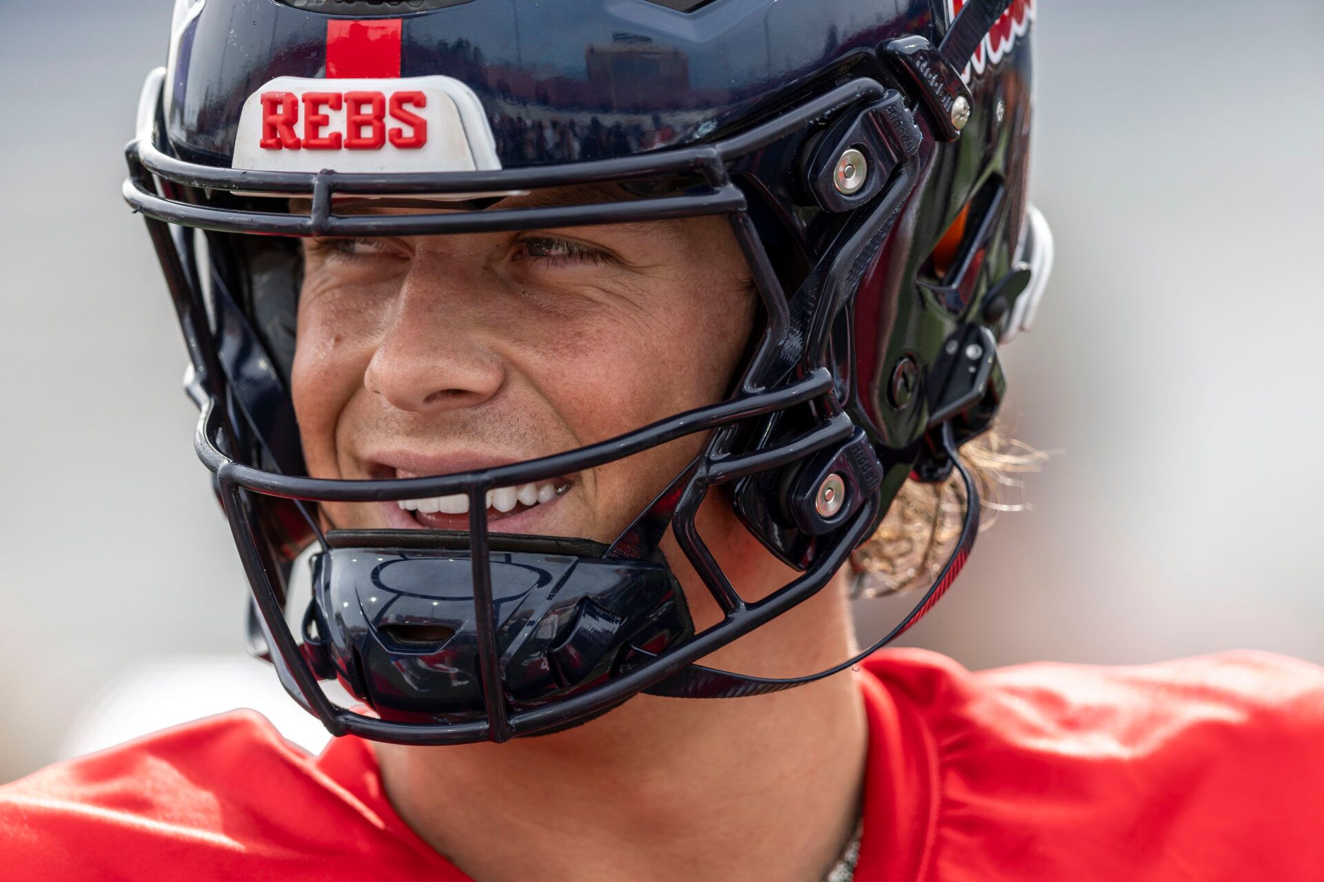 Jan 28, 2025; Mobile, AL, USA; American team quarterback Jaxson Dart of Ole Miss (2) interacts with teammates during Senior Bowl practice for the American team at Hancock Whitney Stadium. Mandatory Credit: Vasha Hunt-Imagn Images