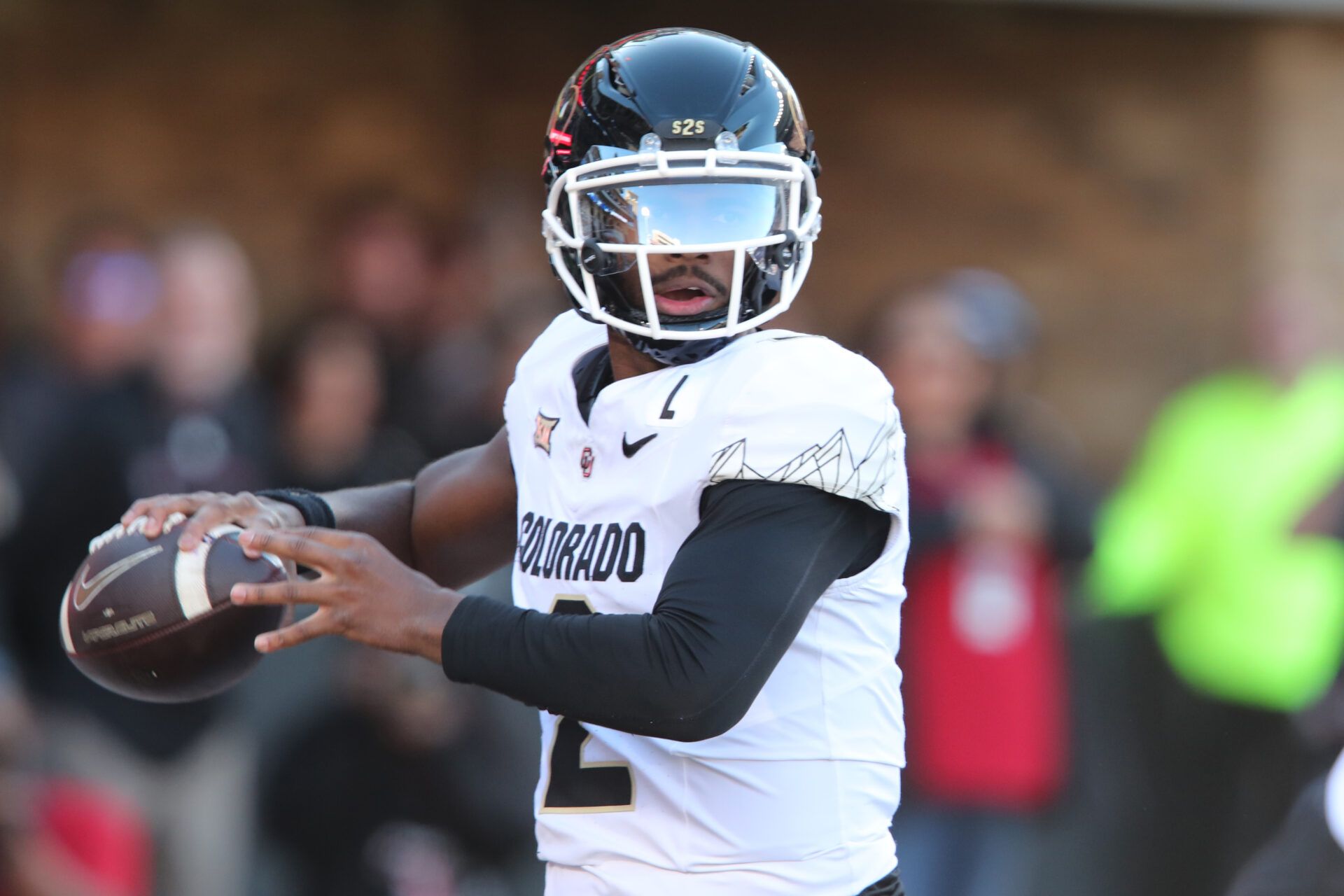 Nov 9, 2024; Lubbock, Texas, USA; Colorado Buffalos quarterback Shedeur Sanders (2) passes against the Texas Tech Red Raiders in the first half at Jones AT&T Stadium and Cody Campbell Field. Mandatory Credit: Michael C. Johnson-Imagn Images