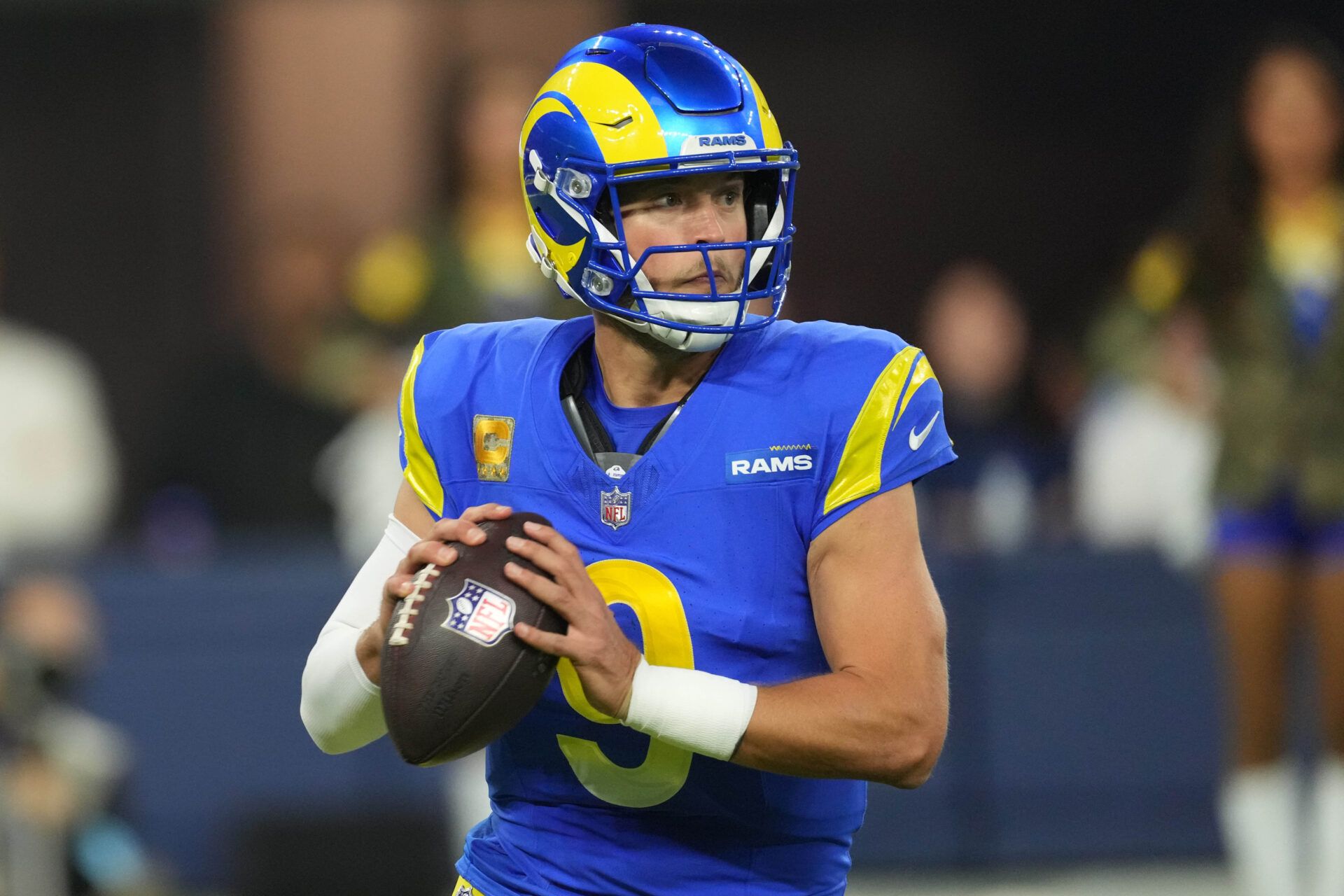 Nov 11, 2024; Inglewood, California, USA; Los Angeles Rams quarterback Matthew Stafford (9) throws the ball against the Miami Dolphins in the second half at SoFi Stadium. Mandatory Credit: Kirby Lee-Imagn Images