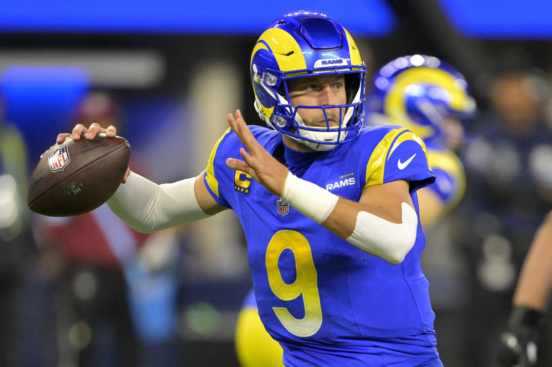 Los Angeles Rams quarterback Matthew Stafford (9) throws a pass against the Arizona Cardinals at SoFi Stadium.